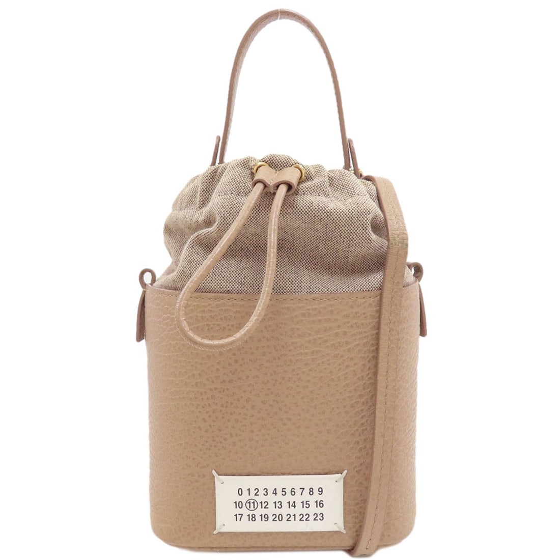 Maisonmargiela 5Ac 2Way Handbag Calf: Maisonmargiela 5Ac 2Way Handbag Calf Brown Calf Maisonmargiela 5Ac 2Way Handbag with Drawstring Closure. This 8.7 inch tall, 4.7 inch deep handbag features a detachable strap and is made from