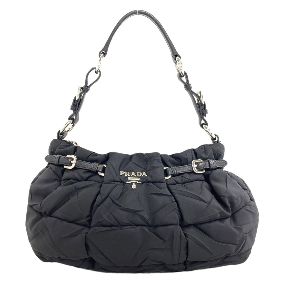 Logo Handbag Nylon Prada: Logo Handbag Nylon Prada Black Logo Handbag Made of Nylon by PRADA. This black nylon handbag features a prominent logo, showcasing the iconic style of PRADA. Made from durable nylon, this handbag is