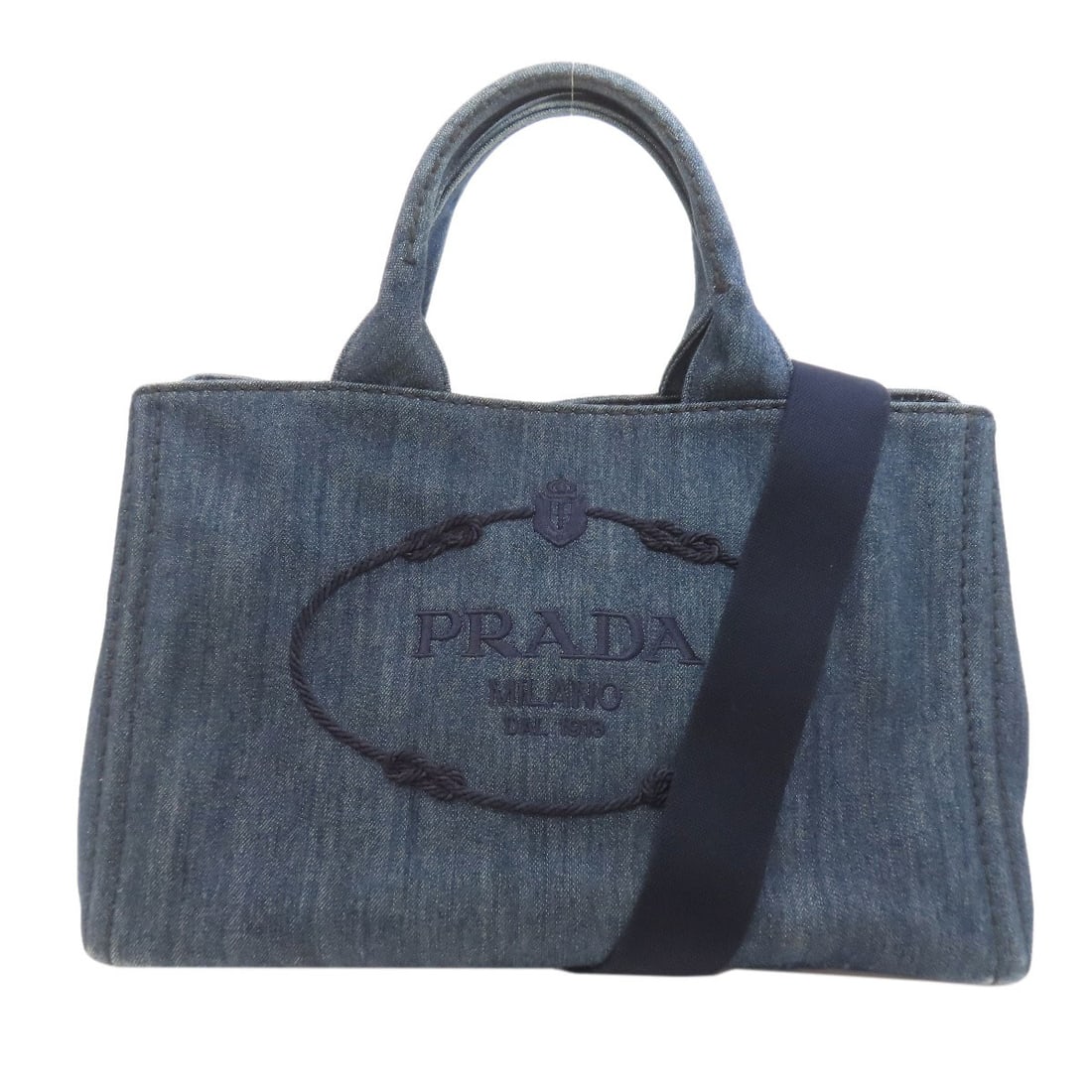 Denim 2Way Handbag Canapa Prada: Denim 2Way Handbag Canapa Prada Blue Denim 2Way Handbag with a unique design. This PRADA handbag features a denim exterior in blue, with a notable 2Way design. The bag's exterior material is denim, pr