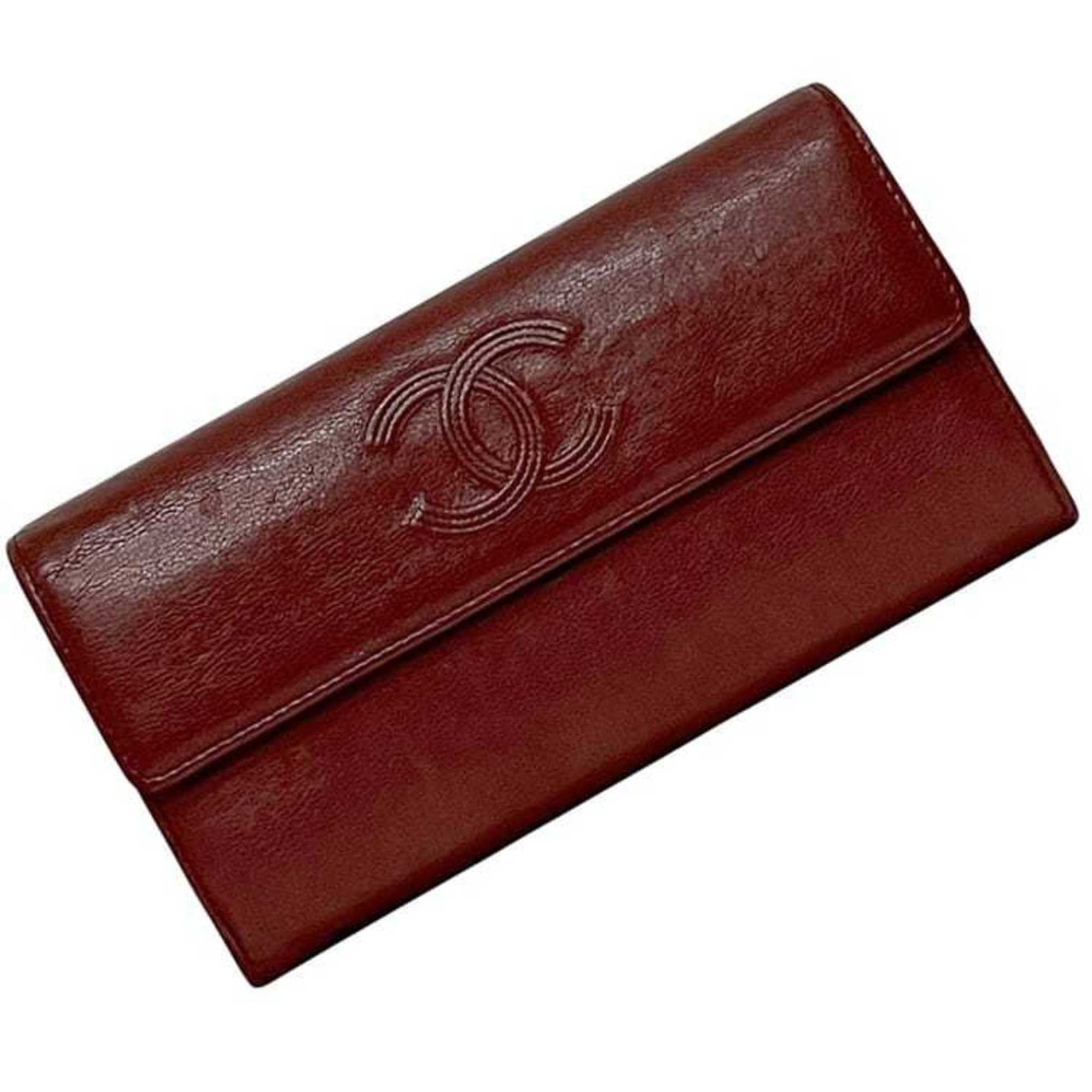 Chanel Long Wallet (Bi-Fold) Leather: Chanel Long Wallet (Bi-Fold) Leather Bordeaux leather construction provides a rich, sophisticated look for this Chanel bi-fold wallet, measuring 10.5cm x 19.5cm x 3cm. The classic design makes it a