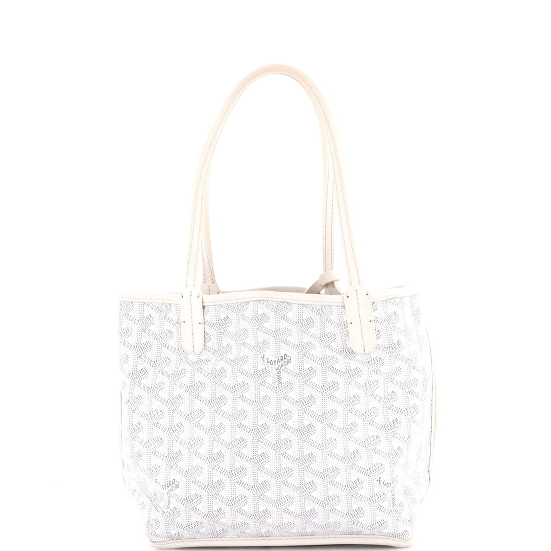 Mini Coated Canvas Reversible Tote Goyard Anjou: Mini Coated Canvas Reversible Tote Goyard Anjou White canvas coated exterior, a classic look for the mini Anjou reversible tote. This stylish bag features a top handle and measures 7" drop, 8"