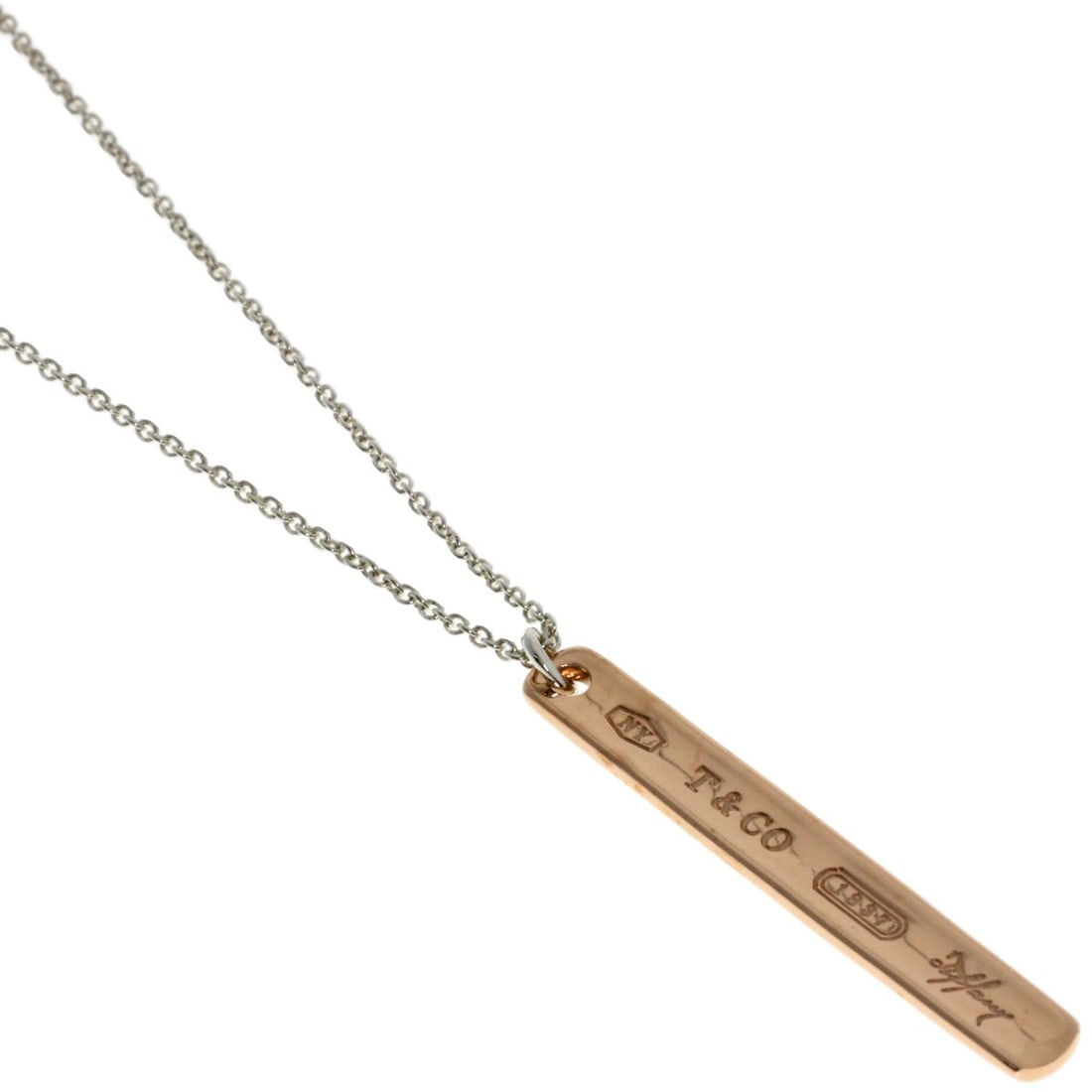 Silver Rubet Metal Bar Necklace Tiffany Co: Silver Rubet Metal Bar Necklace Tiffany Co Silver Rubet Metal Bar Necklace by Tiffany Co. is a striking silver metal bar necklace, featuring a distinctive design with no main stone. Measuring 15.9 inc