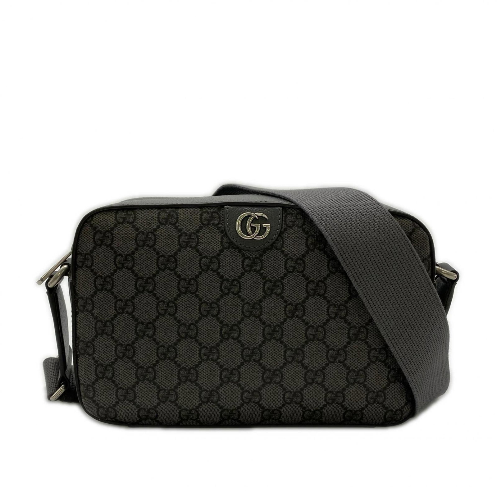 Shoulder Bag Canvas: Shoulder Bag Canvas Gray canvas shoulder bag with a zipper closure, measuring 16.5cm x 26cm x 9cm, features a strap length of 114cm. The bag's canvas material provides a sturdy and durable design, whi