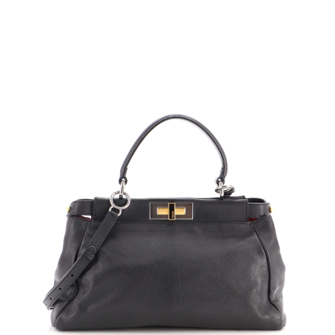 Soft Leather Fendi Peekaboo Bag Regular: Soft Leather Fendi Peekaboo Bag Regular Soft, supple leather wraps around the classic Fendi Peekaboo Bag design, creating a timeless and sophisticated look. The bag's regular size and black exterior