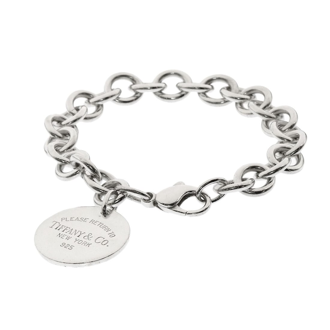 Return To Tiffany Round Silver Tag Bracelet: Return To Tiffany Round Silver Tag Bracelet Silver Round Tag Bracelet from Tiffany&Co. Features a sleek, round design with a silver finish, making it a timeless and elegant accessory. This classic bra