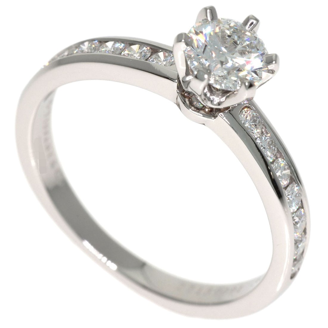 Tiffany&Co Platinum Solitaire Diamond Ring: Tiffany&Co Platinum Solitaire Diamond Ring Platinum Solitaire Diamond Ring from Tiffany&Co. boasts a sleek silver metal design with a 0.43ct D color diamond at its center. The ring's open closure and 