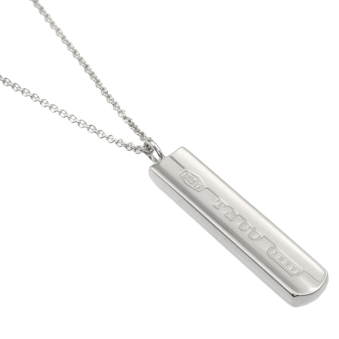 Tiffany & Co Silver Bar Necklace 1837: Tiffany & Co Silver Bar Necklace 1837 Tiffany & Co's iconic silver bar necklace, crafted in 1837, is a stunning piece of history. This 18.1-inch long necklace features a silver bar with no stone, maki