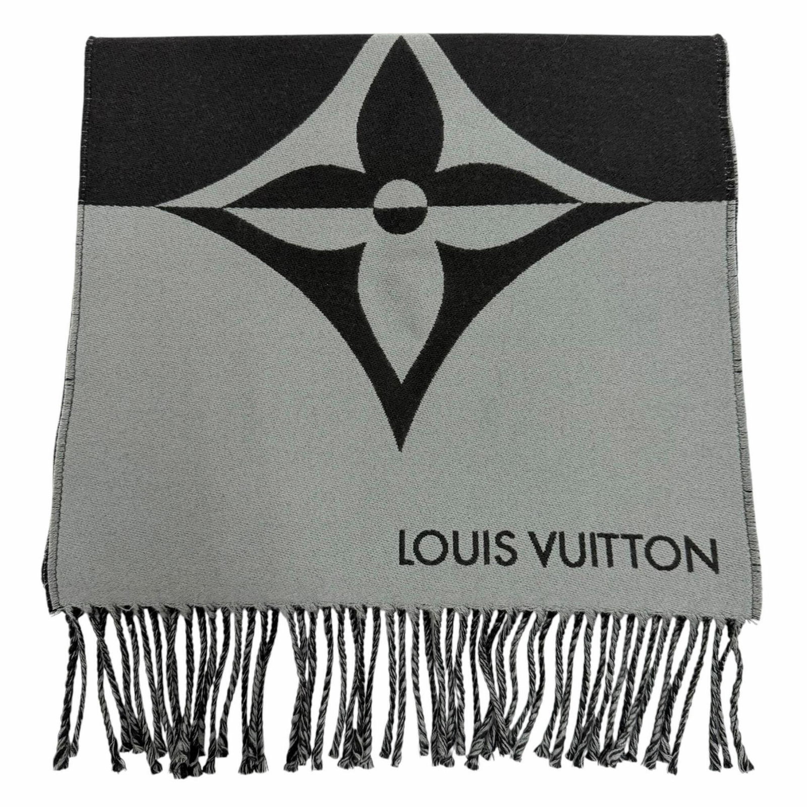 Stole Louis Vuitton Wool Cashmere: Stole Louis Vuitton Wool Cashmere Stole made from luxurious wool and cashmere, this Louis Vuitton piece measures 1.8m x 35cm and boasts a sleek Noir color. The Italian craftsmanship is evident in its
