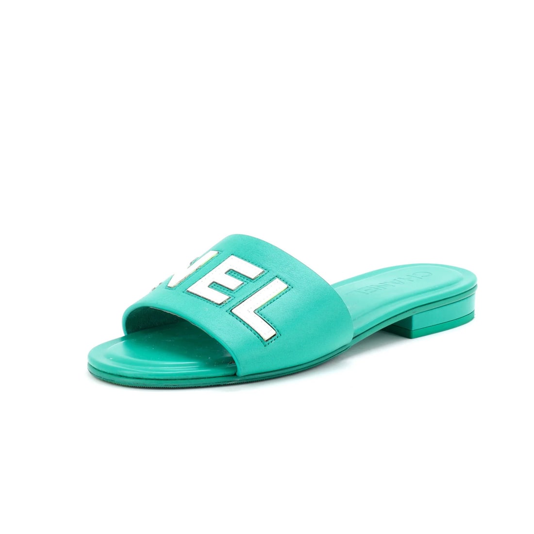 Chanel Women's CHA-NEL Mule Sandals Leather: Chanel Women's CHA-NEL Mule Sandals Leather Green leather mule sandals from Chanel, featuring a classic design with a resoled outer sole and subtle signs of wear. The item has a very good condition,