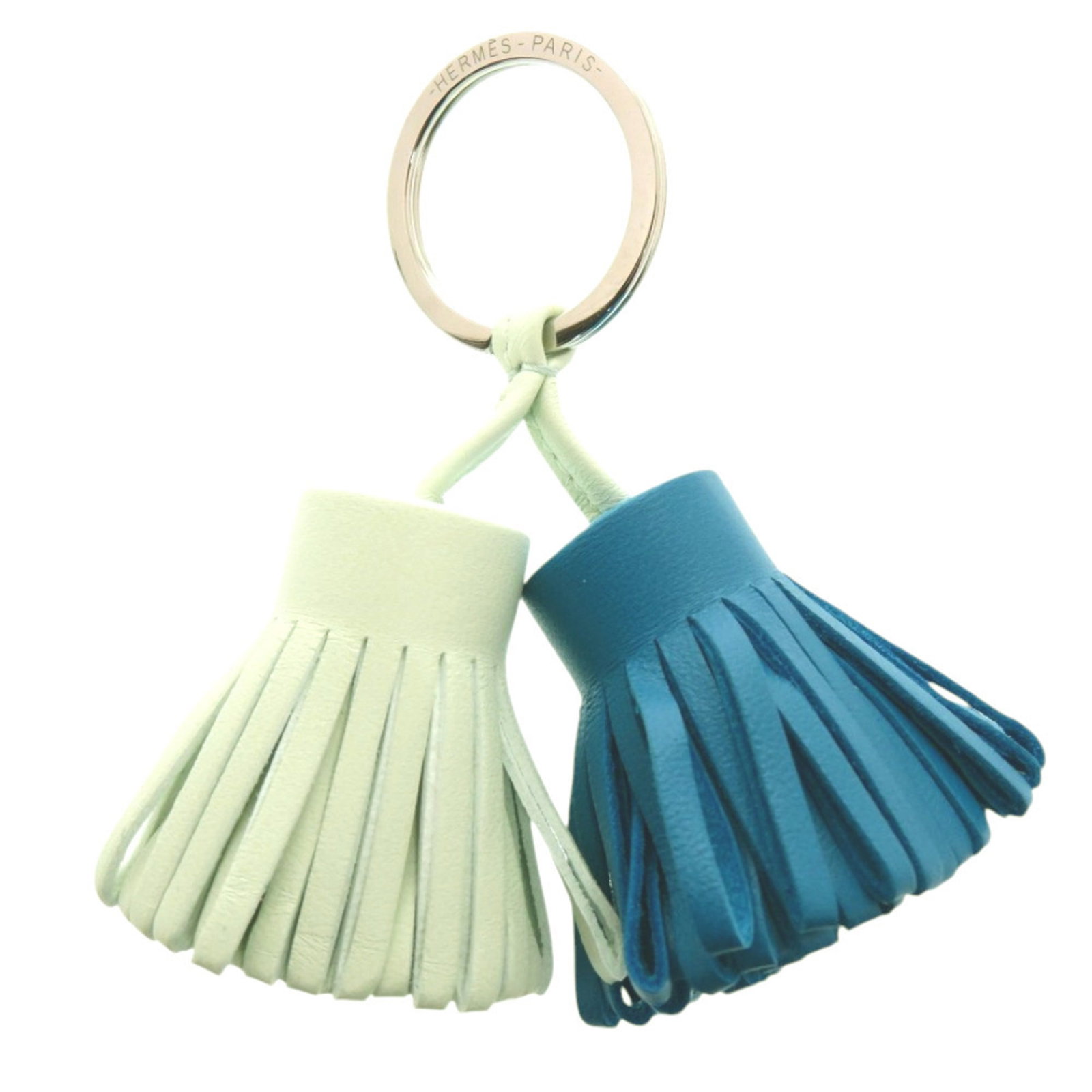 Keyring Agneau Milo Hermes: Keyring Agneau Milo Hermes Agneau Milo is a French material known for its softness and durability. This Keyring features a blue Agneau Milo design, measuring 9cm x 9cm x 2.5cm. Item Specifics: Brand:
