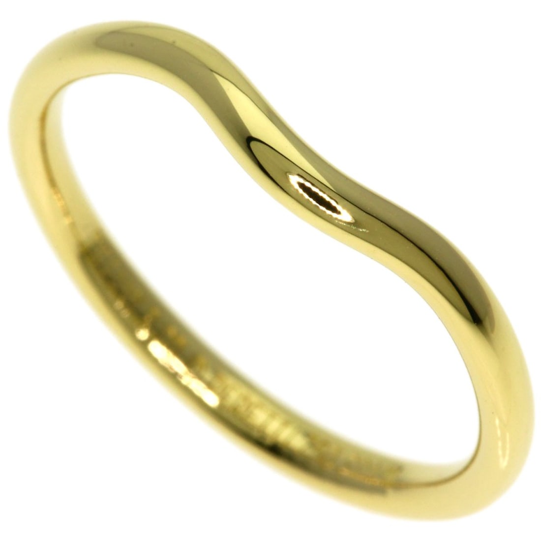 Tiffany&Co Curved Gold K18 Yellow Ring Band: Tiffany&Co Curved Gold K18 Yellow Ring Band Tiffany&Co's Curved Gold K18 Yellow Ring Band is a stunning example of 18K yellow gold craftsmanship. Its curved design adds a touch of elegance to any outf