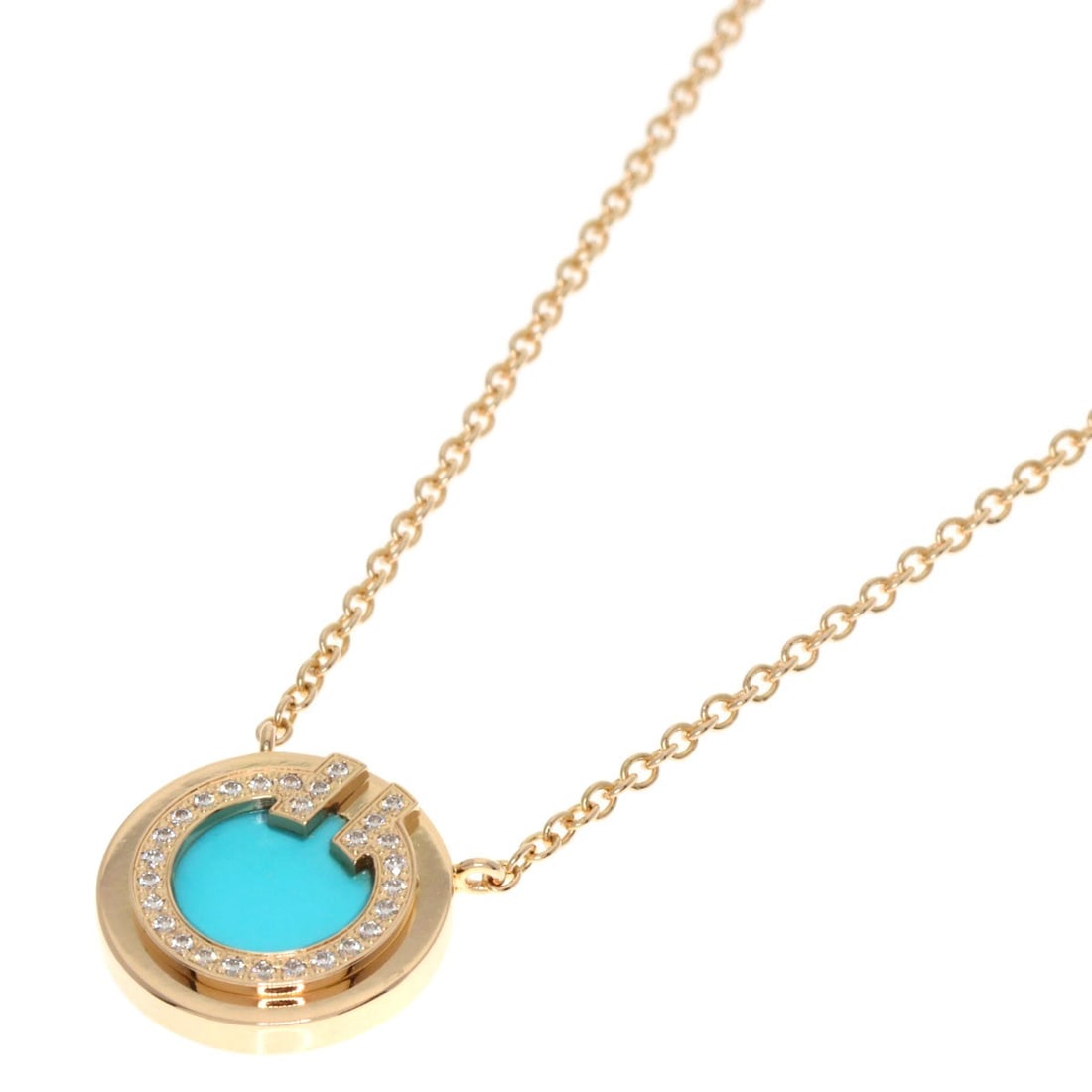 Tiffany & Co. T Necklace K18 Pink Gold Turquoise Diamond: Tiffany & Co. T Necklace K18 Pink Gold Turquoise Diamond K18 Pink Gold Turquoise Diamond Necklace by Tiffany & Co. boasts a striking combination of turquoise and diamond, set against a luxurious