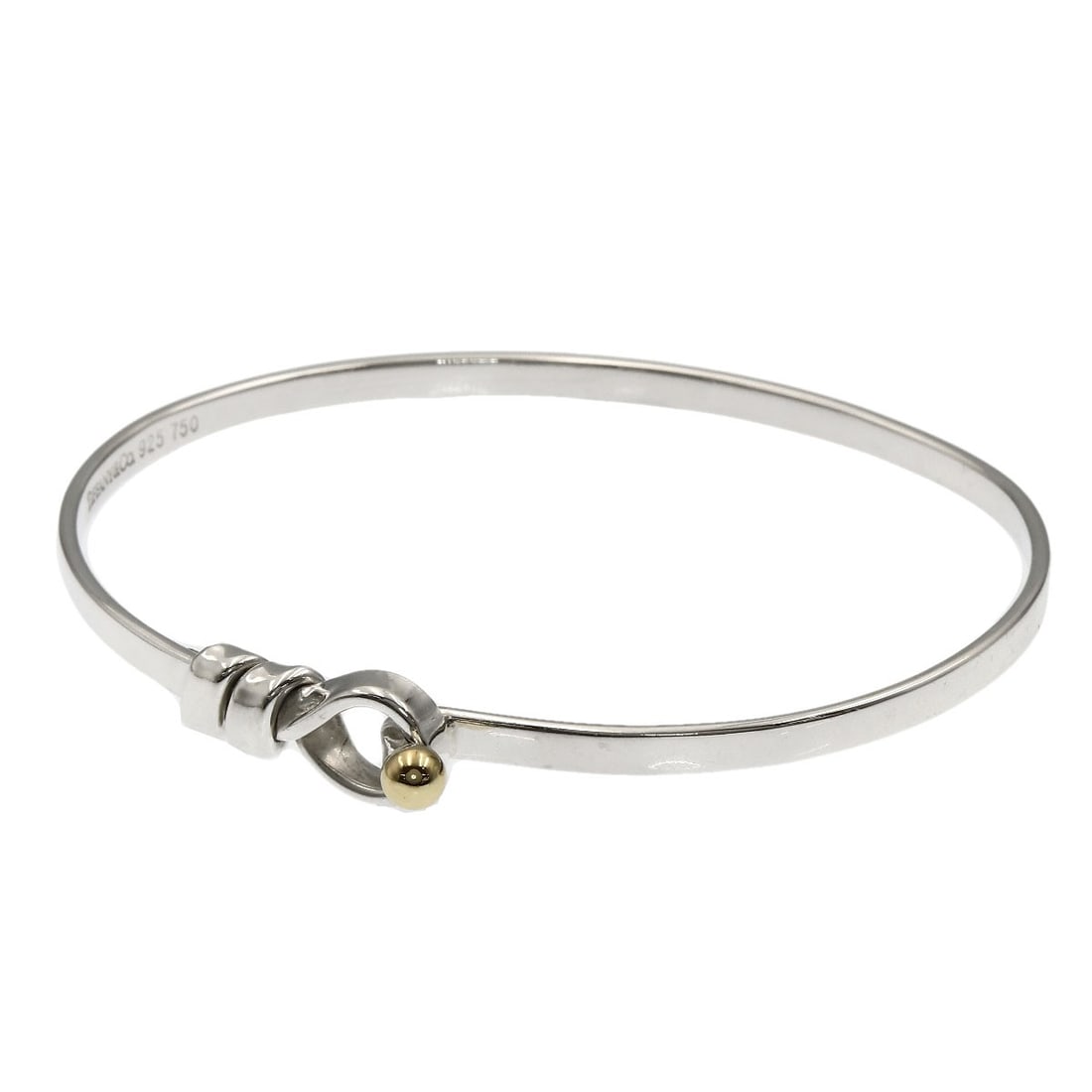 Tiffany Co Flat Wire Silver 18K Yellow Gold: Tiffany Co Flat Wire Silver 18K Yellow Gold Tiffany Co Flat Wire Silver 18K Yellow Gold is a sleek and sophisticated bracelet made from 18K yellow gold wire, expertly crafted by Tiffany&Co. Its silver