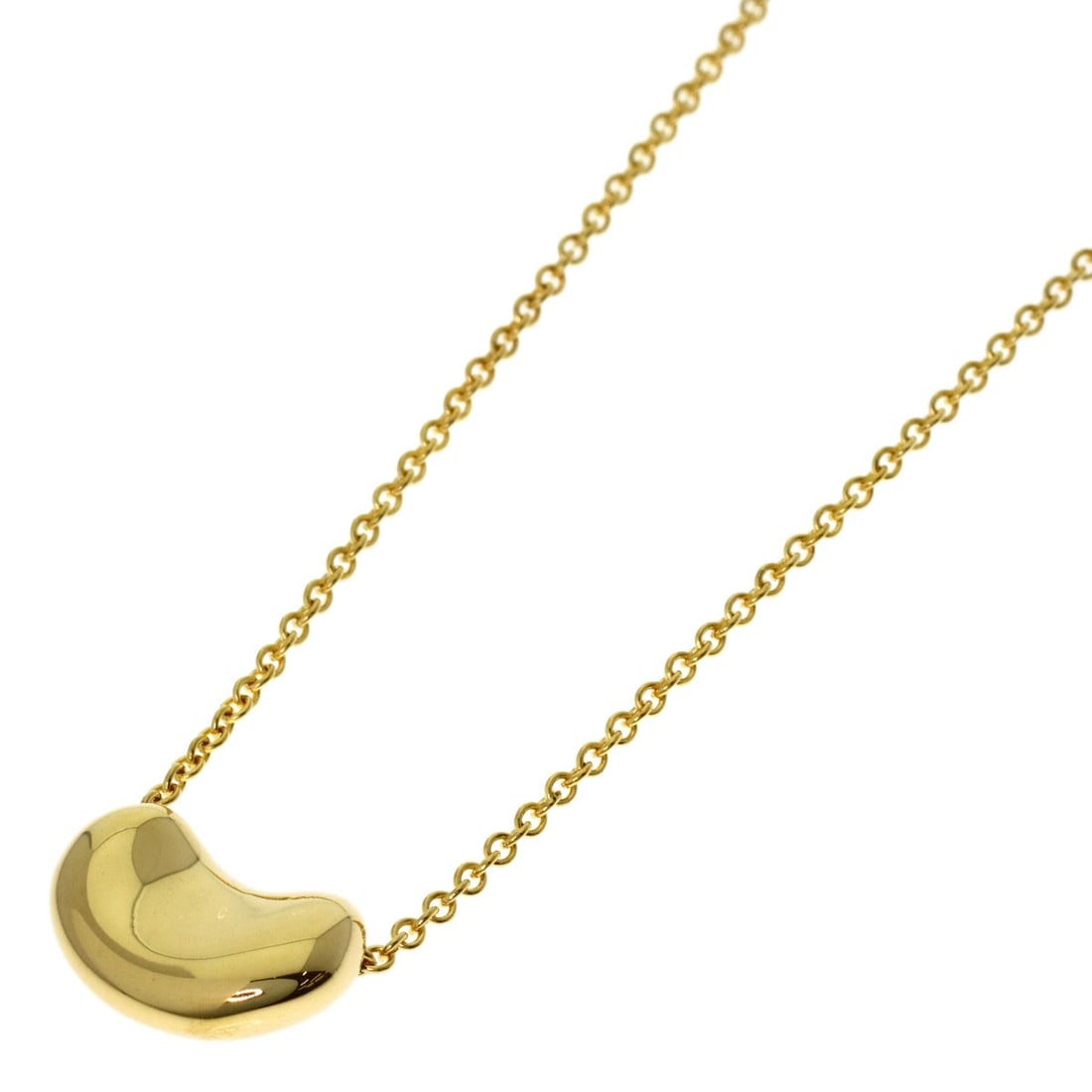 Yellow Gold Tiffany&Co K18 Bean Necklace: Yellow Gold Tiffany&Co K18 Bean Necklace K18 Yellow Gold Tiffany&Co Bean Necklace features a striking design with no main stone, showcasing the beauty of the gold metal. This 15.7-inch long necklace