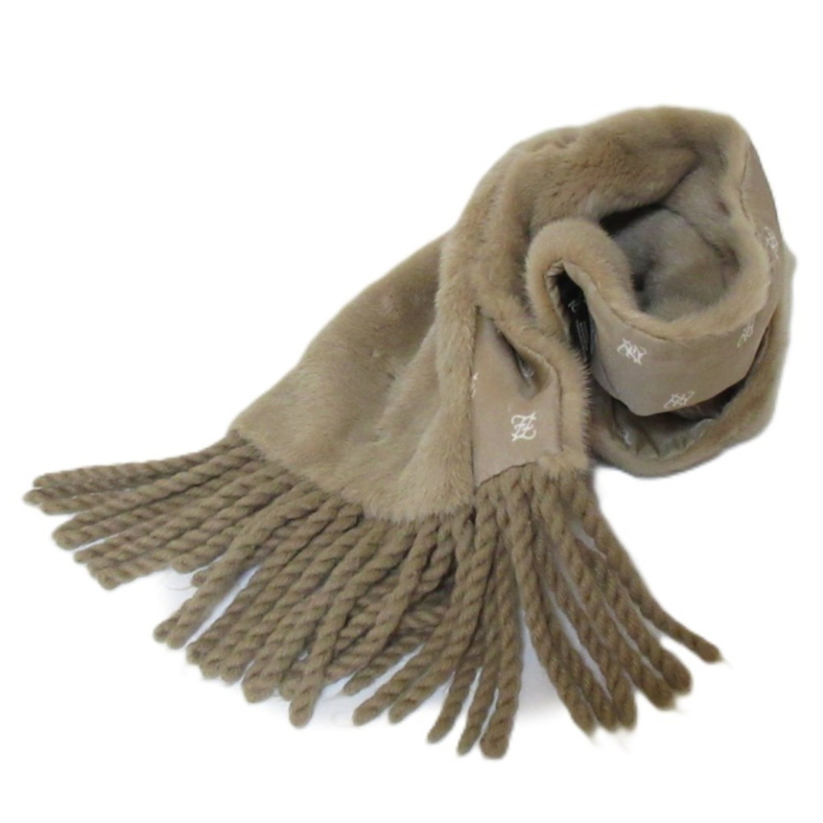 Fur Stole by Fendi: Fur Stole by Fendi Fur stole by Fendi, made from luxurious mink fur and complemented by leather, measures 1.31m x 15.5cm. The beige and brown coloration adds a natural touch to this stylish accessory.