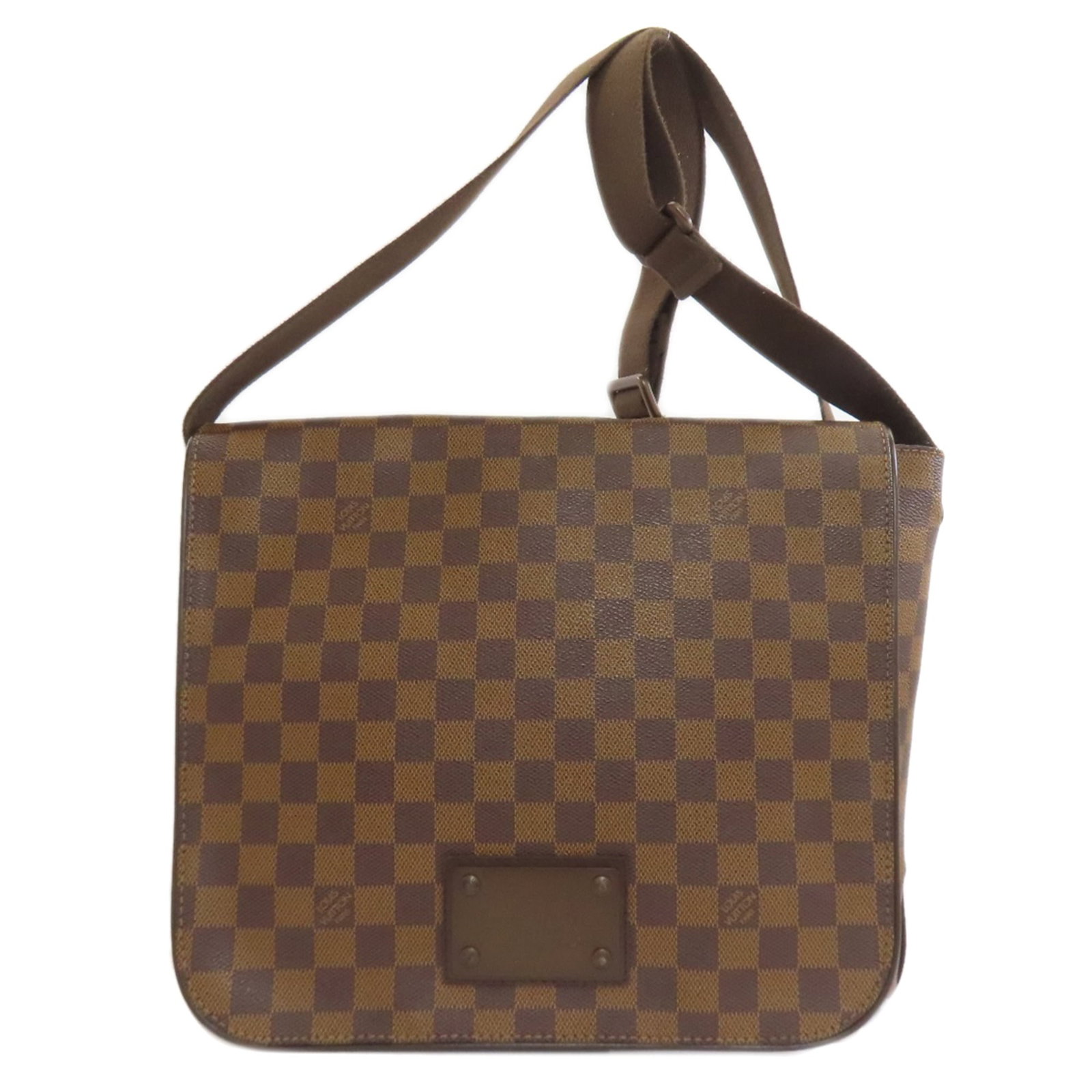 Shoulder Bag Damier Canvas By Louis Vuitton: Shoulder Bag Damier Canvas By Louis Vuitton Damier Canvas by Louis Vuitton Shoulder Bag. This iconic shoulder bag features the signature Damier canvas pattern in a classic brown and Ebene color