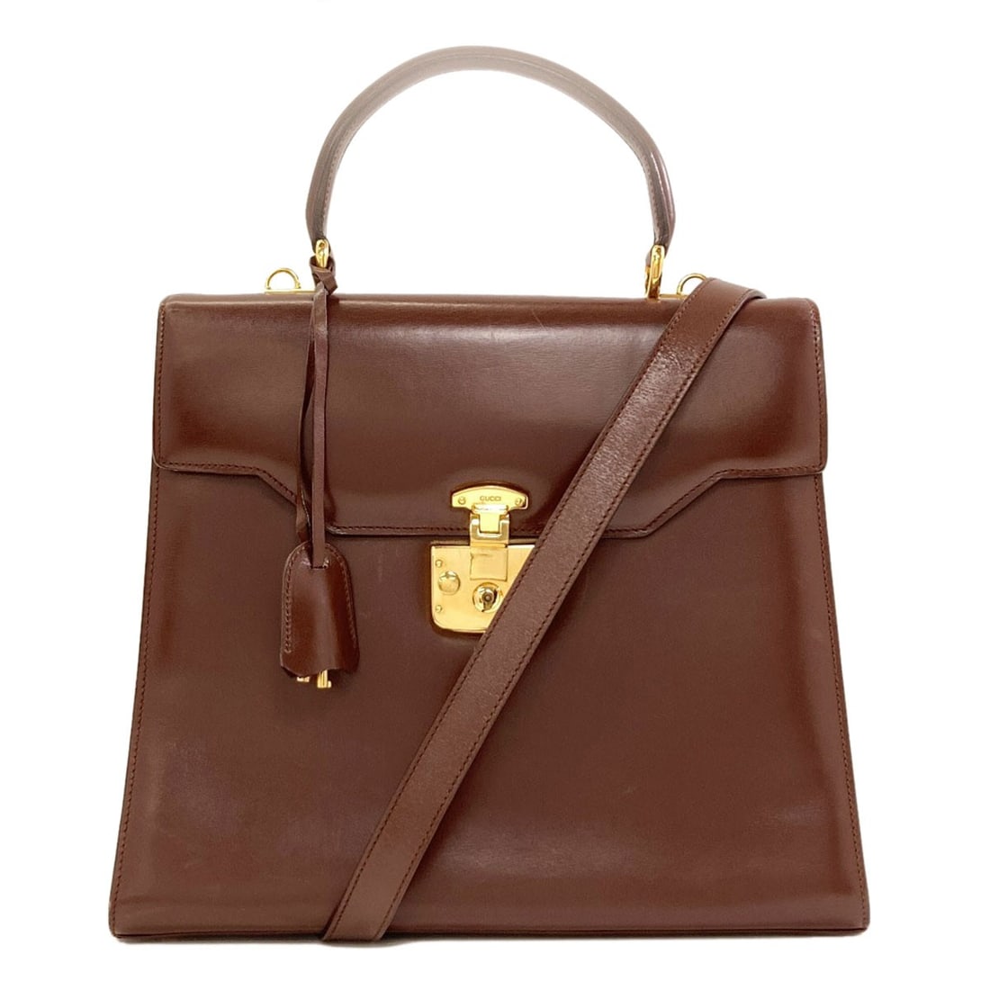 Handbag Leather 2Way 01 0192 Gucci: Handbag Leather 2Way 01 0192 Gucci Brown leather handbag with a 2-way design, bearing a signature. Made from high-quality leather, this Gucci handbag is a stylish and timeless accessory. The signature