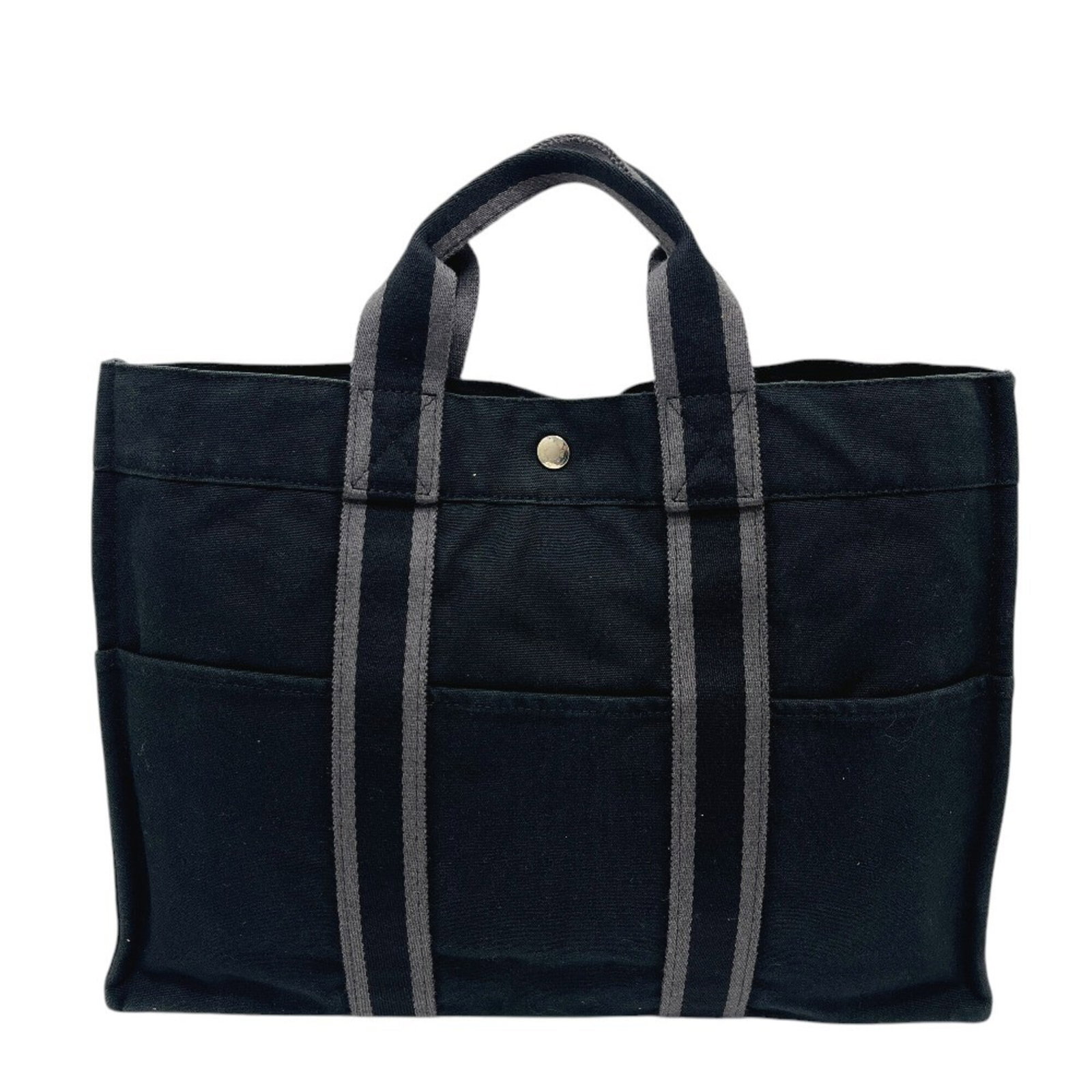 Handbag Tote Bag Canvas Hermes: Handbag Tote Bag Canvas Hermes Canvas tote bag from Hermes, made from high-quality canvas material, features a sleek black design. This 30cm x 42cm tote bag measures 11.81'' x 16.53'' x 3.93'' and is 