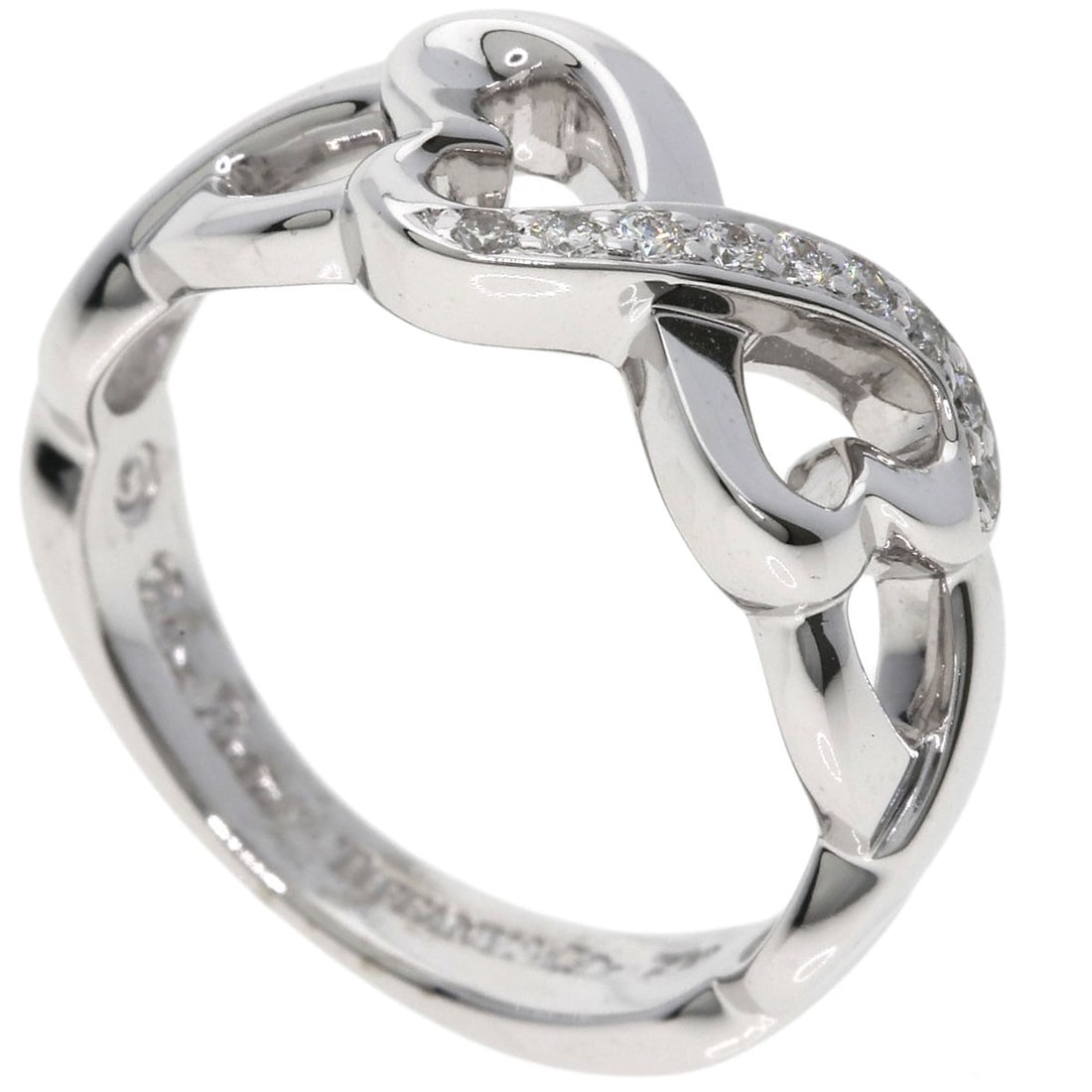 Loving Heart Diamond Ring Tiffany&Co. K18 White Gold: Loving Heart Diamond Ring Tiffany&Co. K18 White Gold K18 White Gold Diamond Ring from Tiffany&Co. boasts a striking silver metal exterior and features a main diamond stone, set in a classic ring