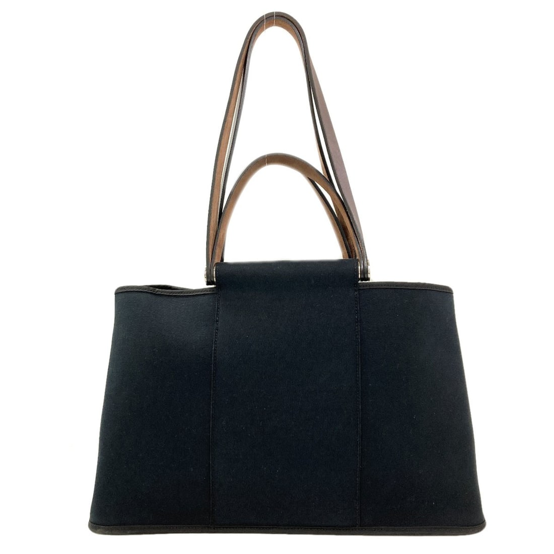 Hermes Kabak Elan Silverhardware Tote Bag Canvas: Hermes Kabak Elan Silverhardware Tote Bag Canvas Black canvas tote bag with silver hardware from Hermes, a stylish and versatile accessory. The bag's canvas exterior is a classic choice, while the