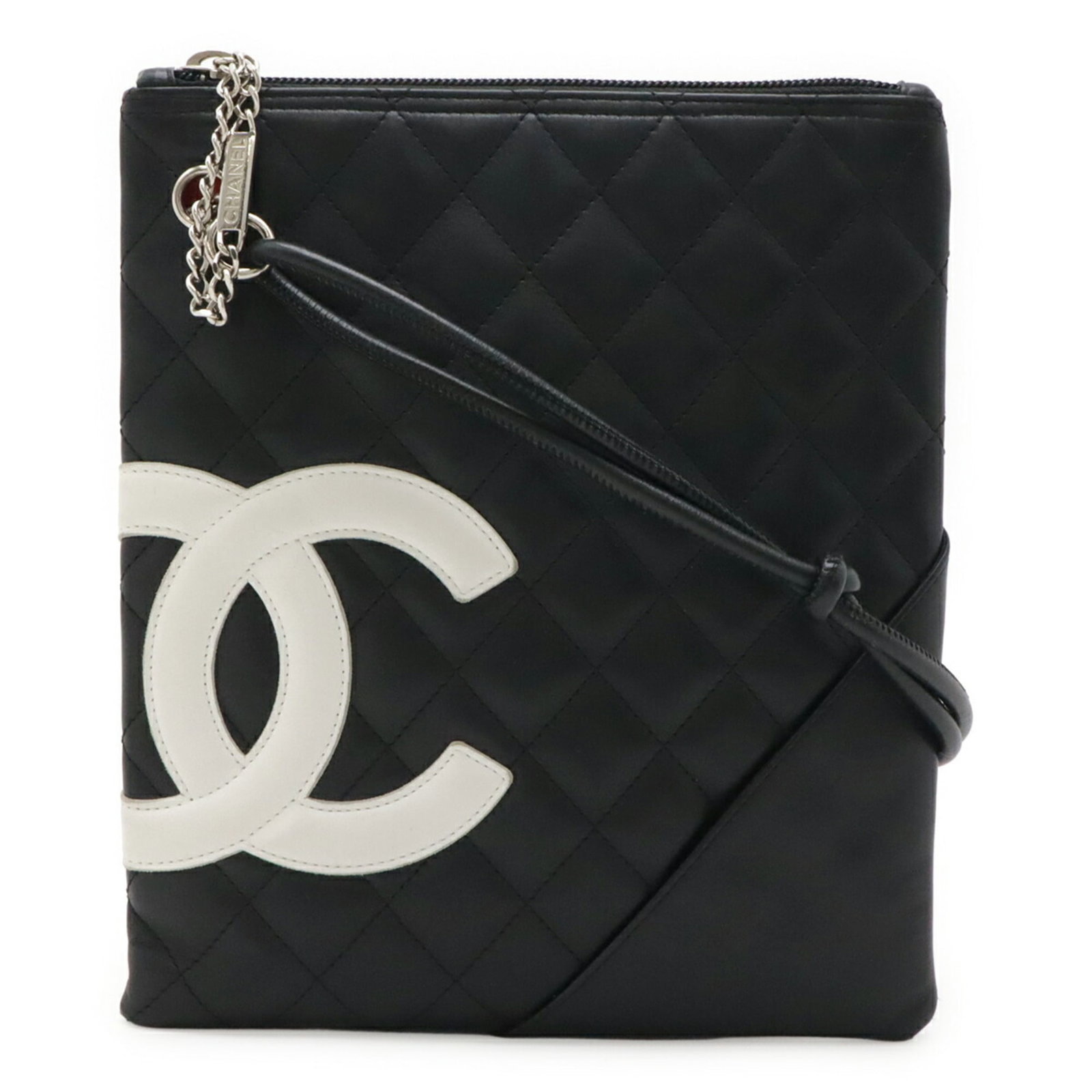 Shoulder Bag Leather Chanel: Shoulder Bag Leather Chanel Black and White Chanel Shoulder Bag. Made from high-quality Calfskin leather, this shoulder bag features a sleek and sophisticated design. With its compact size and classic