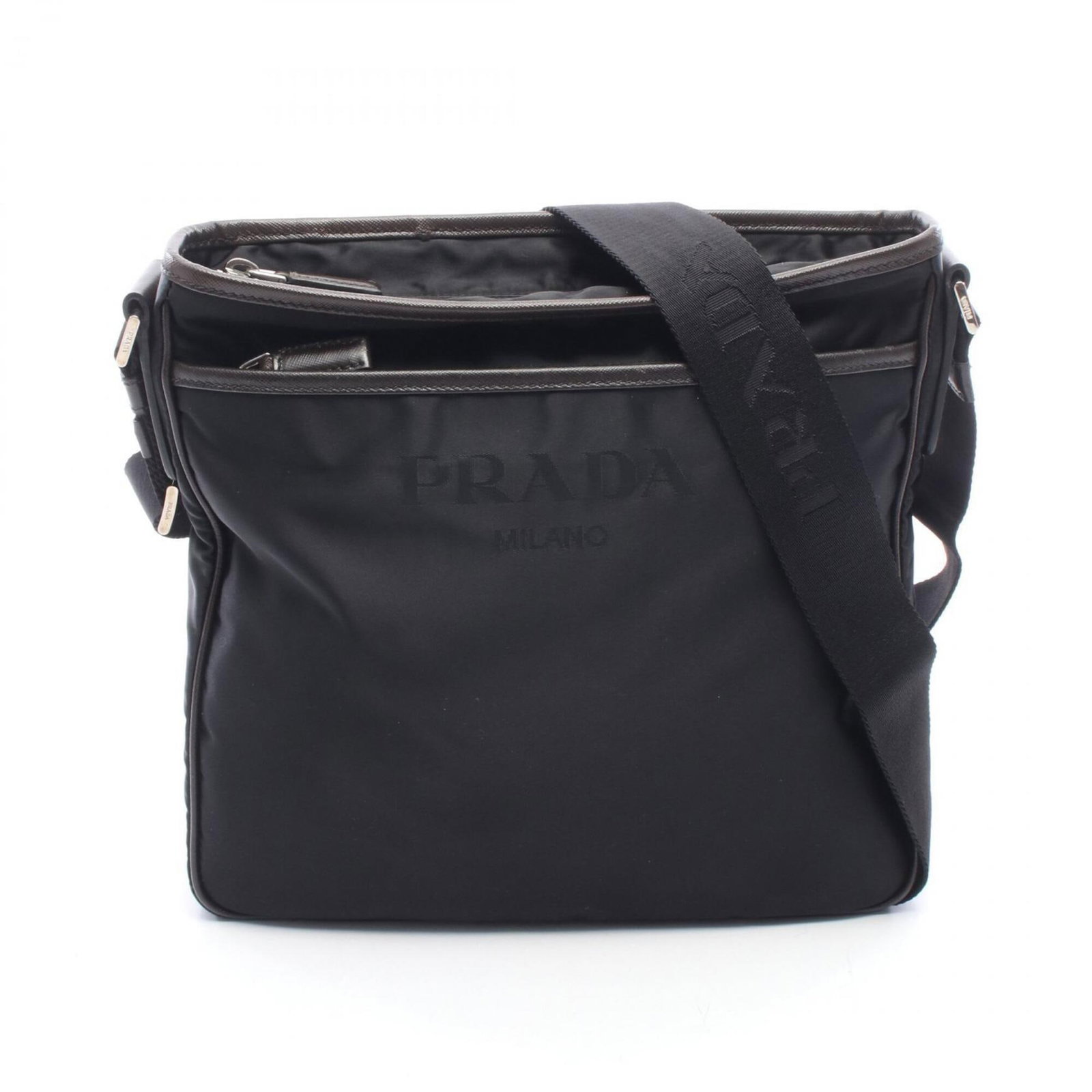 Handbag Nylon Leather Bag Prada Shoulder: Handbag Nylon Leather Bag Prada Shoulder This Prada shoulder bag features a unique combination of nylon and leather materials, creating a distinctive look. Its sleek black design and compact size make