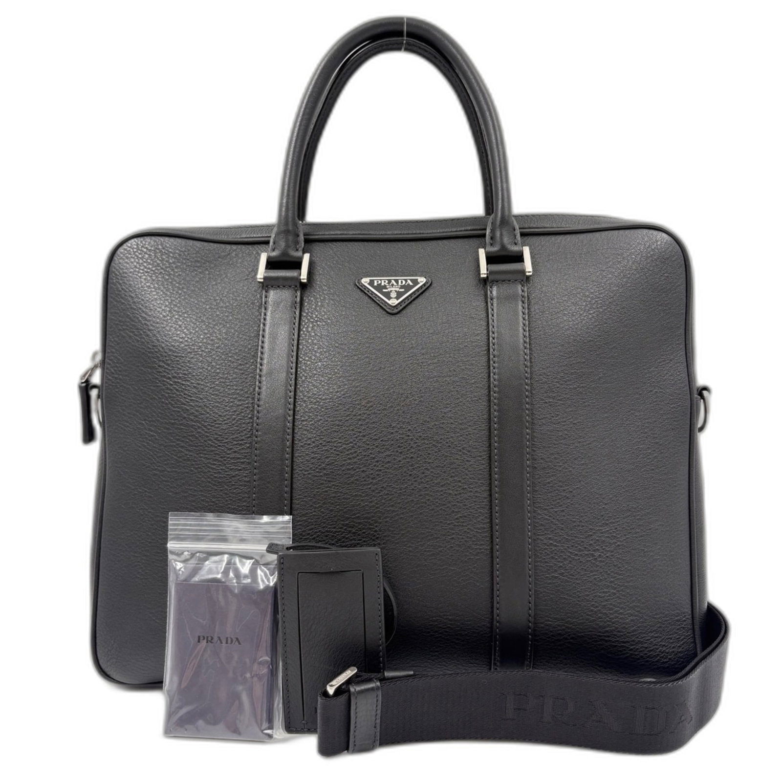 Shoulder Bag Prada Handbag: Shoulder Bag Prada Handbag This Prada shoulder bag is a sleek and sophisticated black handbag with a classic design. Measuring 30cm x 36cm x 4cm, it features a long strap that can be adjusted to fit c