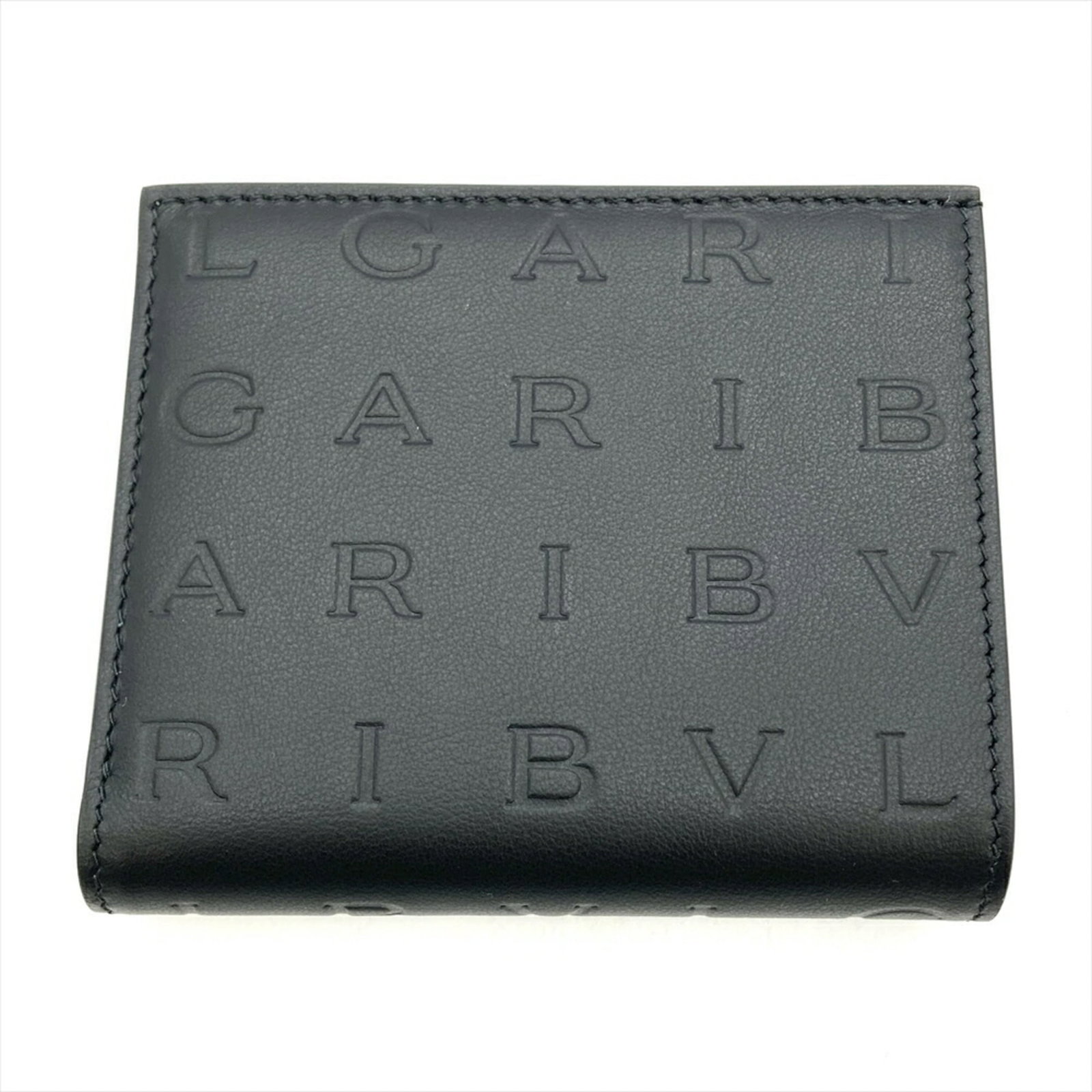 Bi Fold Leather Wallet: Bi Fold Leather Wallet Black bi-fold leather wallet with a sleek design, measuring 9cm x 10.5cm x 2.5cm. Comes with a sturdy box for storage and protection. A simple yet functional accessory for