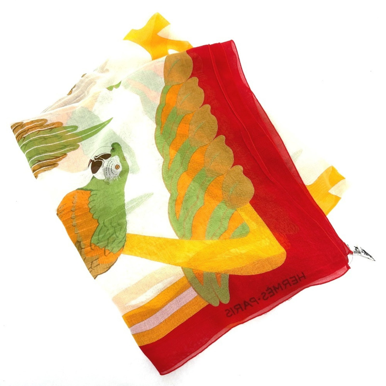 Stole Cotton: Stole Cotton Stole Cotton from Herm?s is a vibrant, multi-colored piece measuring 1.4m x 1.7m, showcasing a unique blend of off-white and red hues. Made from high-quality cotton, this stole boasts a