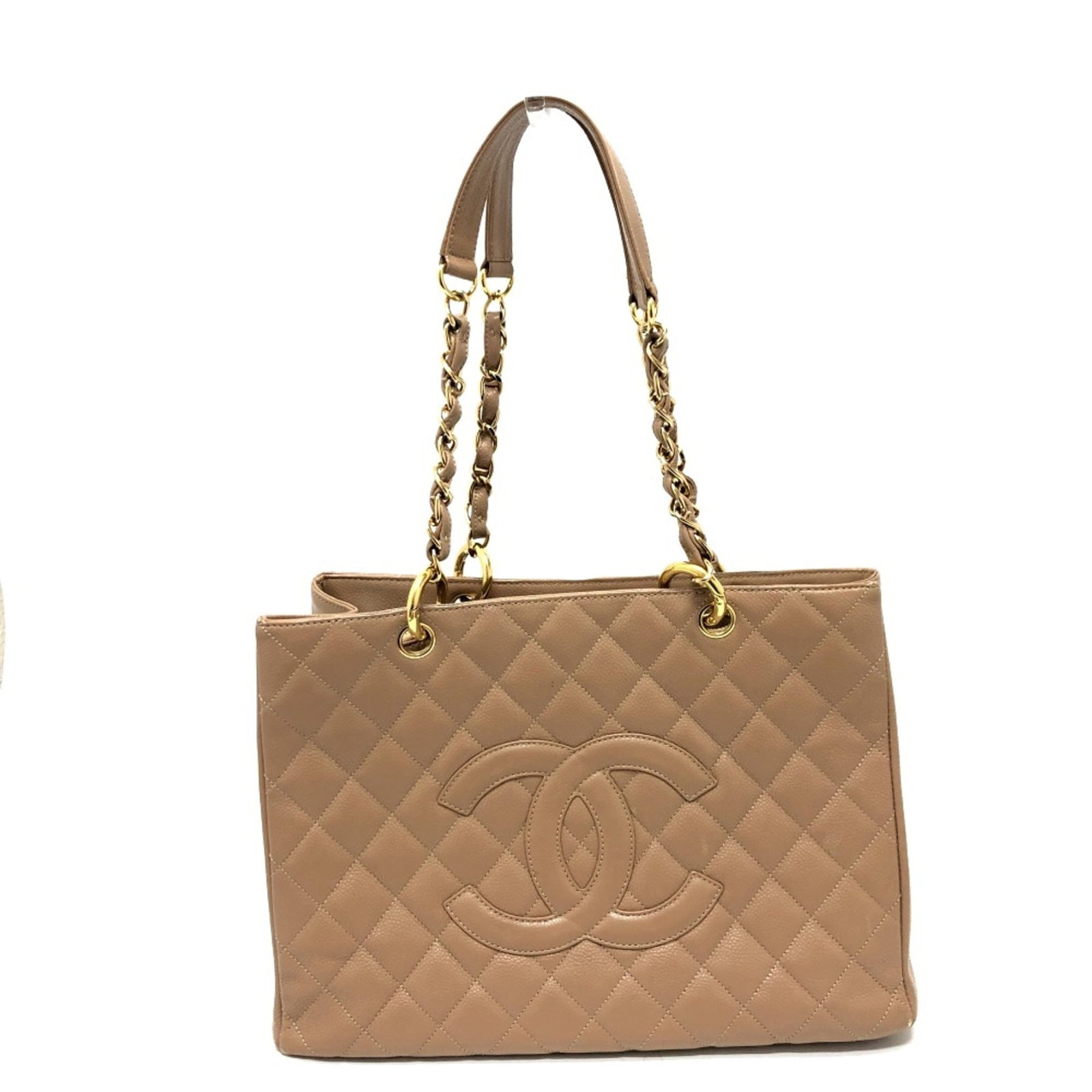 Shoulder Bag Leather Chanel: Shoulder Bag Leather Chanel This beige leather shoulder bag from Chanel features a classic design with clean lines and a timeless aesthetic. Measuring 33cm x 24cm x 13cm, it has a sturdy 21.3inch