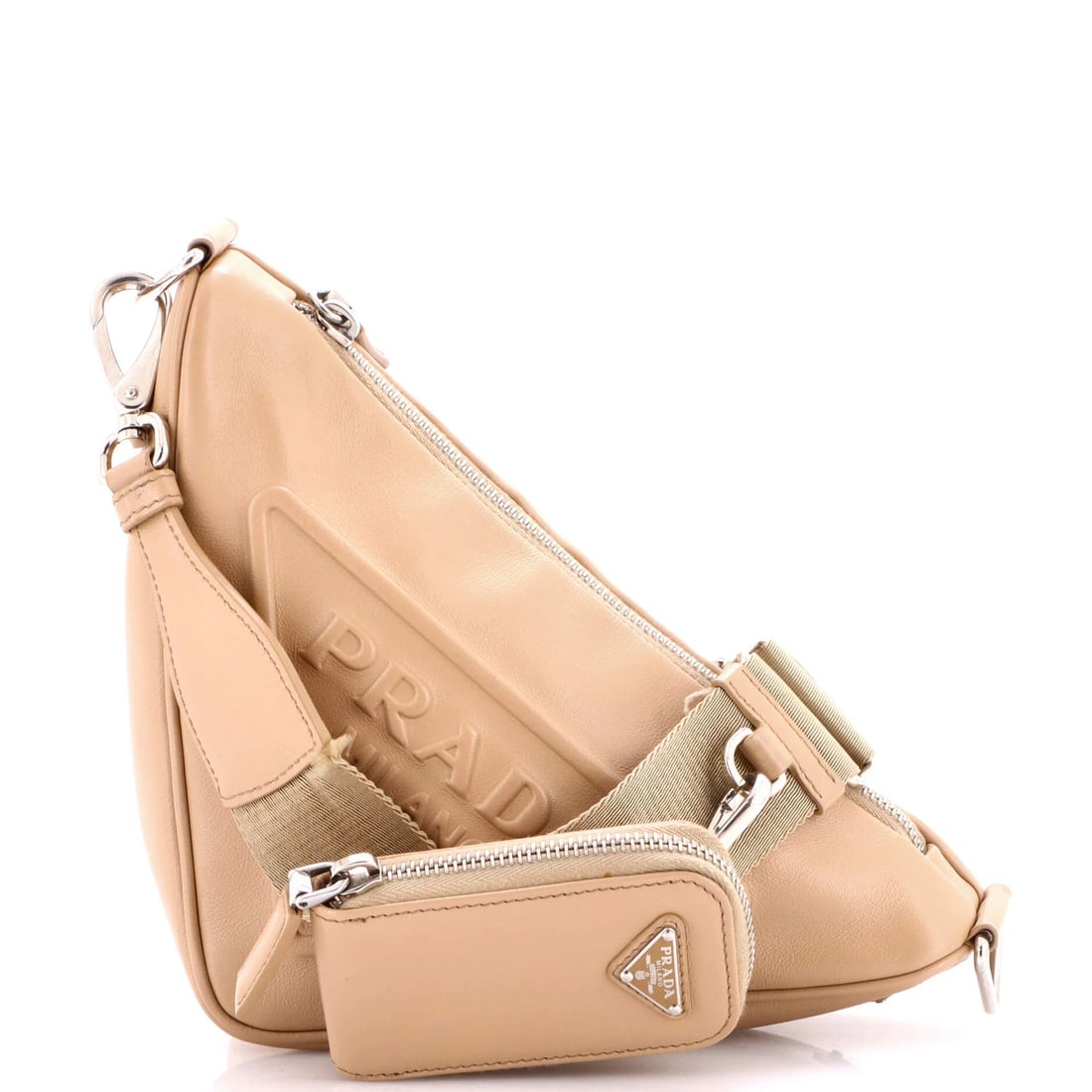 Small crossbody bag with triangle logo, leather, and zip.: Small crossbody bag with triangle logo, leather, and zip. Small Prada crossbody bag with a triangle logo, made from high-quality leather, features a neutral exterior color and a silver zip. The bag me