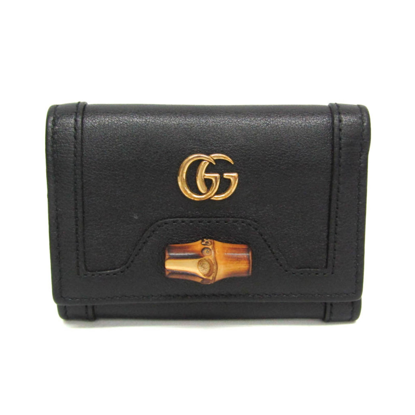 Gucci Wallet (Tri-Fold) Leather: Gucci Wallet (Tri-Fold) Leather The Gucci Diana Compact Wallet is a sleek and functional tri-fold leather wallet, crafted from high-quality black leather. This Italian-made wallet features a compact