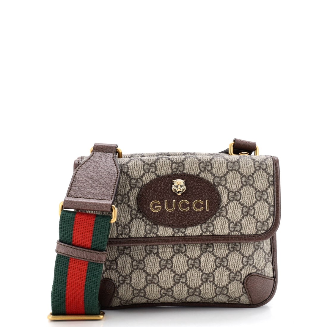 Small canvas messenger flap coated GG Gucci: Small canvas messenger flap coated GG Gucci Small canvas messenger flap coated GG Gucci bag in brown exterior, featuring a neutral interior and aged gold hardware. The bag boasts a classic neo