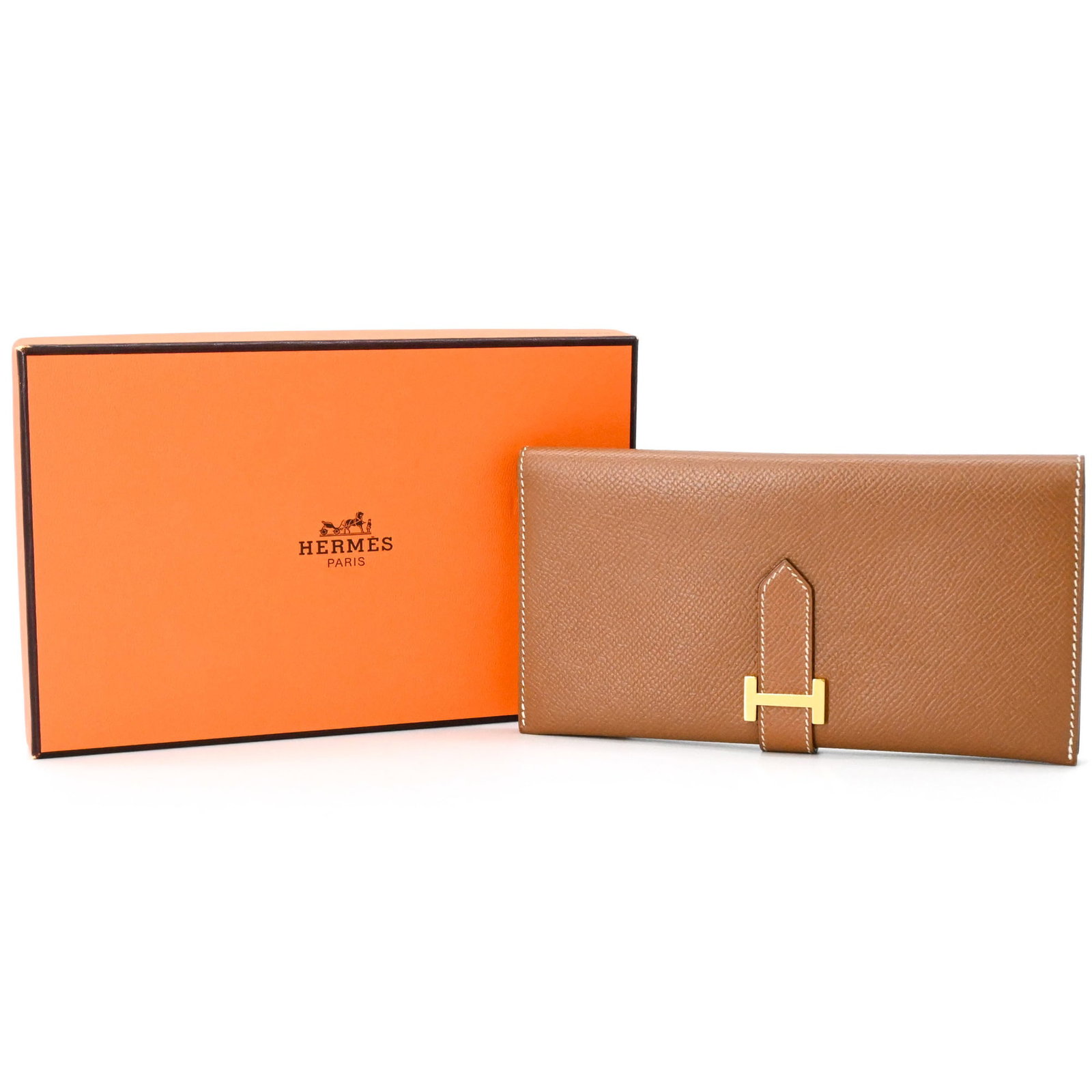 Hermes Coin Purse/ Coin Case Courchevel Leather: Hermes Coin Purse/ Coin Case Courchevel Leather The Hermes Courchevel Leather Coin Purse boasts a timeless design, crafted from rich gold brown Courchevel leather. Measuring 9cm x 17.5cm x 1cm, this