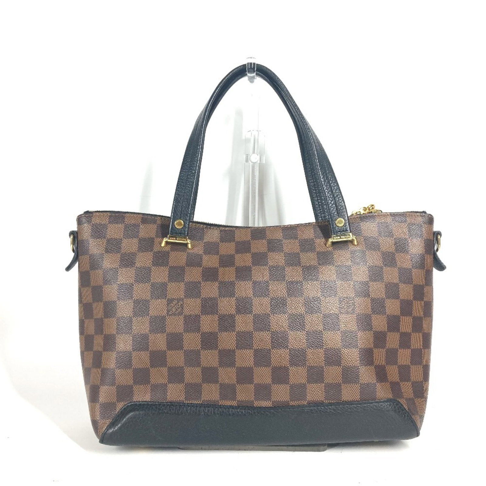 Damier Canvas Leather Louis Vuitton Tote Bag: Damier Canvas Leather Louis Vuitton Tote Bag Damier Canvas Leather Louis Vuitton Tote Bag is made from Damier Canvas and features leather accents. The bag is available in black, brown, and Damier