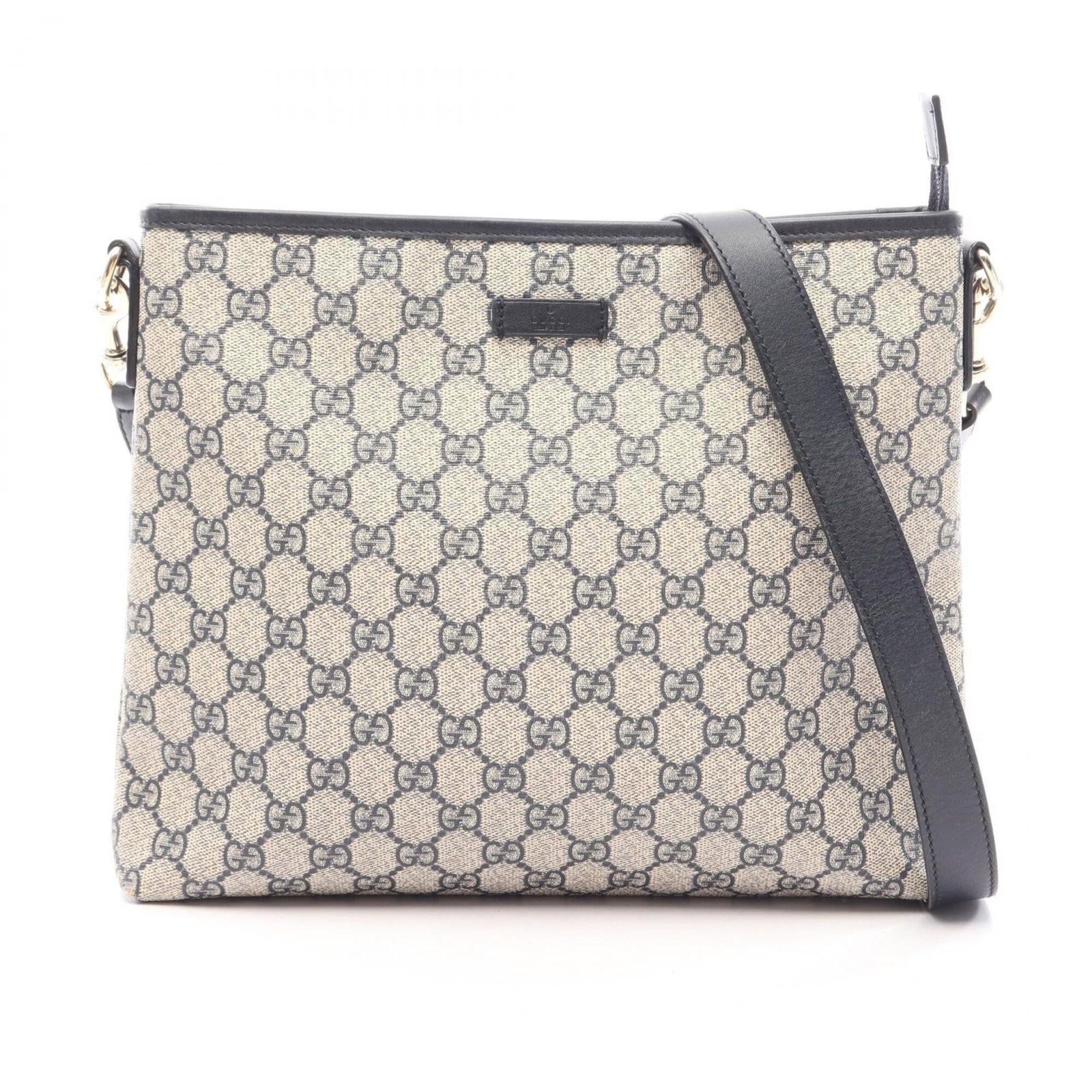 Gucci Shoulder Bag Gg Supreme Leather: Gucci Shoulder Bag Gg Supreme Leather GG Supreme Leather shoulder bag from Gucci, featuring a classic design with a timeless ivory and navy color combination. The bag measures 26cm x 29cm x 5cm, makin