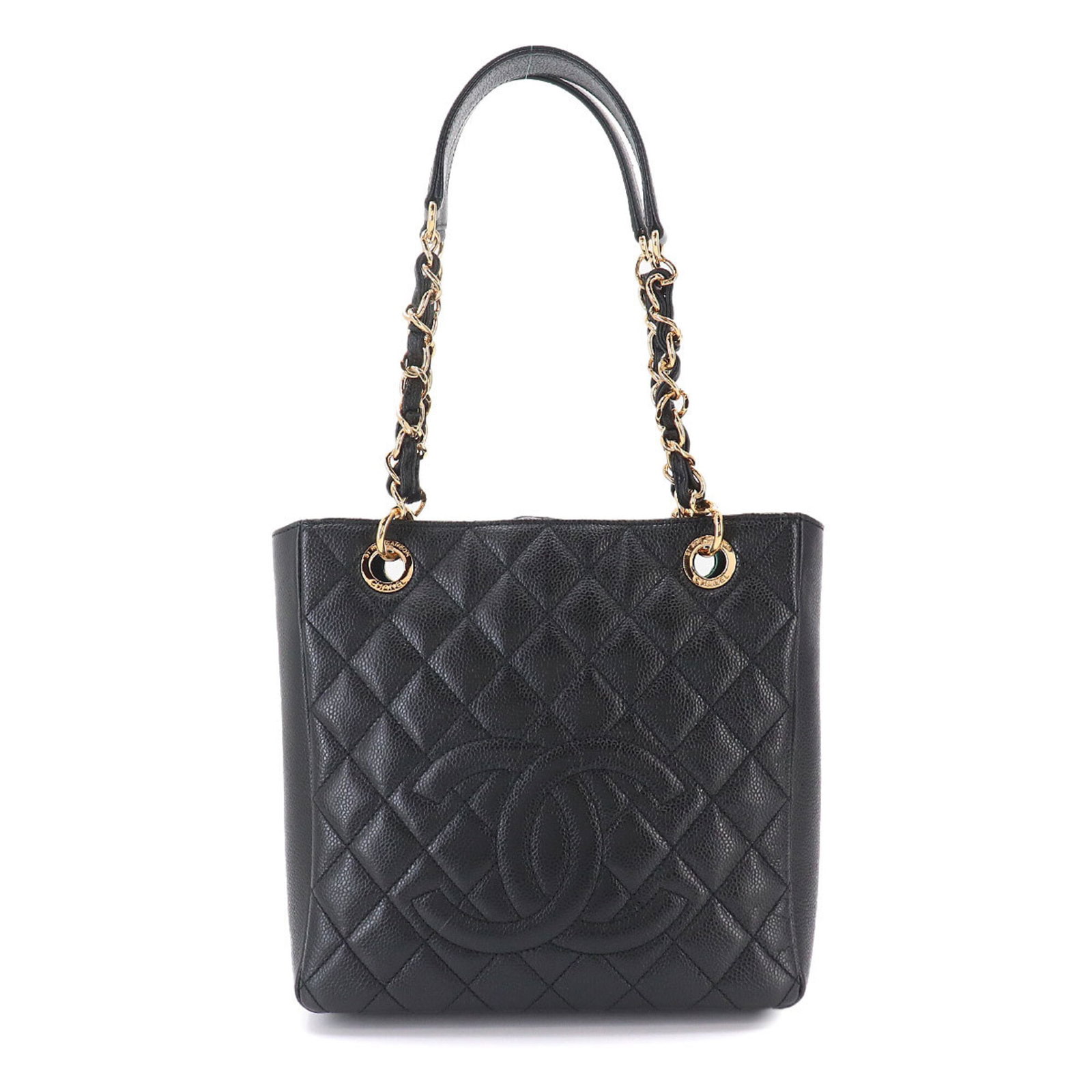 Calfskin Grained Chanel Tote Bag: Calfskin Grained Chanel Tote Bag Grained calfskin gives this black Chanel tote bag a luxurious feel, while the gold hardware adds a touch of sophistication. With its classic matelasse design and