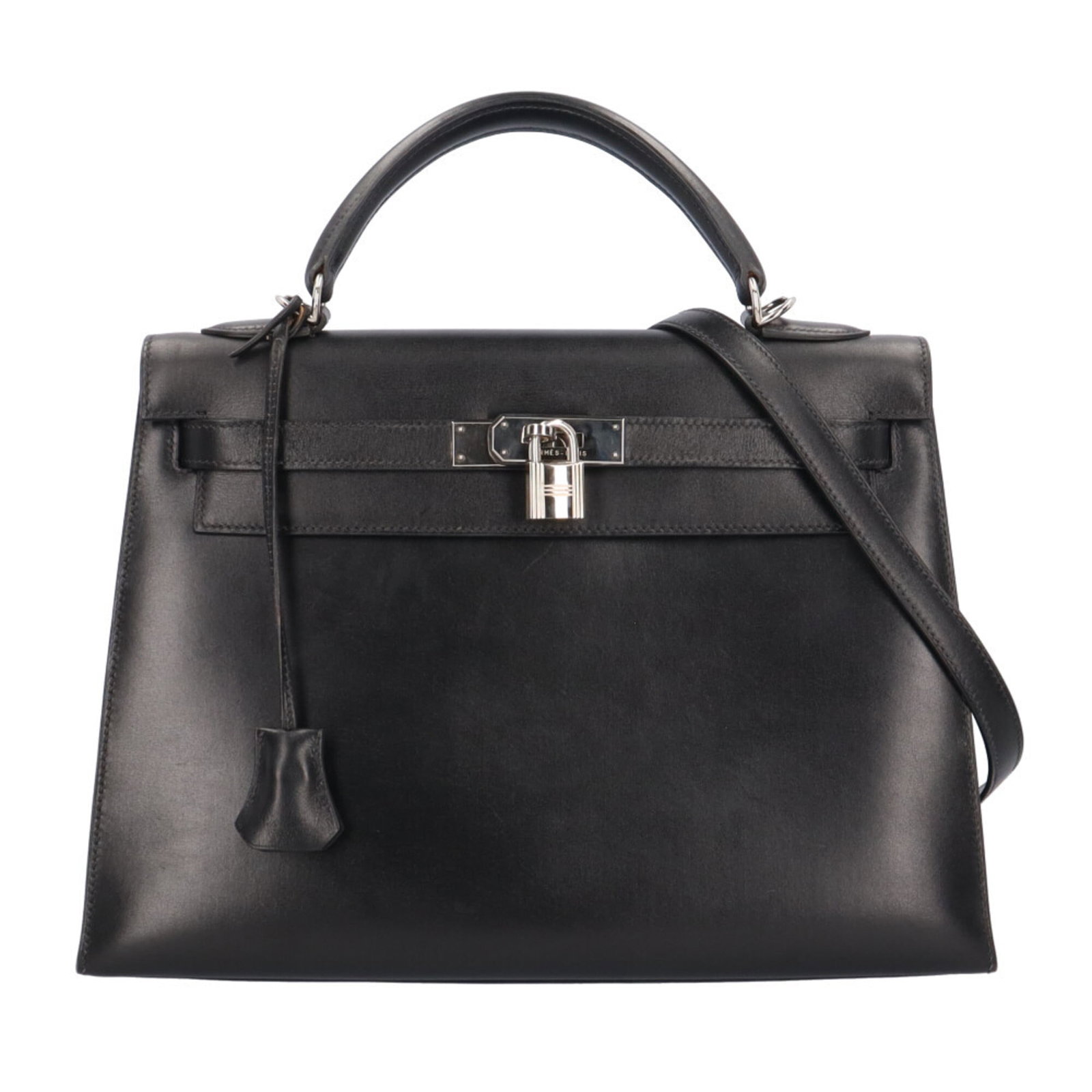Calf Leather Shoulder Bag Box Hermes: Calf Leather Shoulder Bag Box Hermes Box calf leather construction provides a rich, luxurious feel to this black shoulder bag, while its sleek design and compact size make it a versatile accessory for