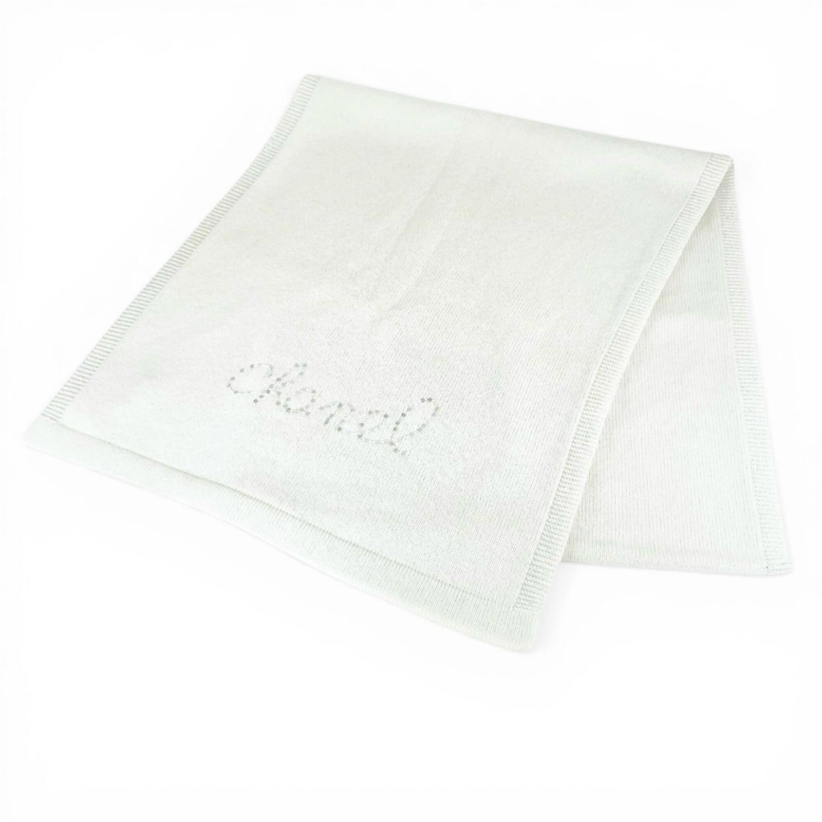 Cashmere Stole Chanel: Cashmere Stole Chanel Cashmere Stole from Chanel, crafted from luxurious cashmere and polyamide, boasts a striking white hue. Measuring 1.84m x 40cm, this stole is a statement piece that adds elegance