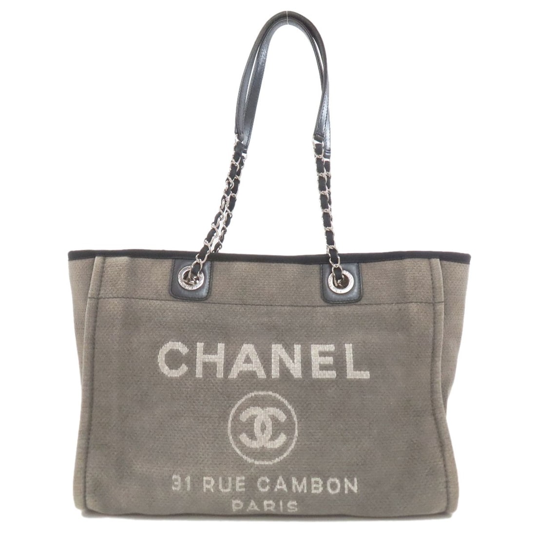 Chanel Deauville Silverhardware Tote Bag Canvas: Chanel Deauville Silverhardware Tote Bag Canvas Gray canvas tote bag with silver hardware from CHANEL, featuring a classic design. The bag's exterior is made of high-quality canvas, and it boasts a