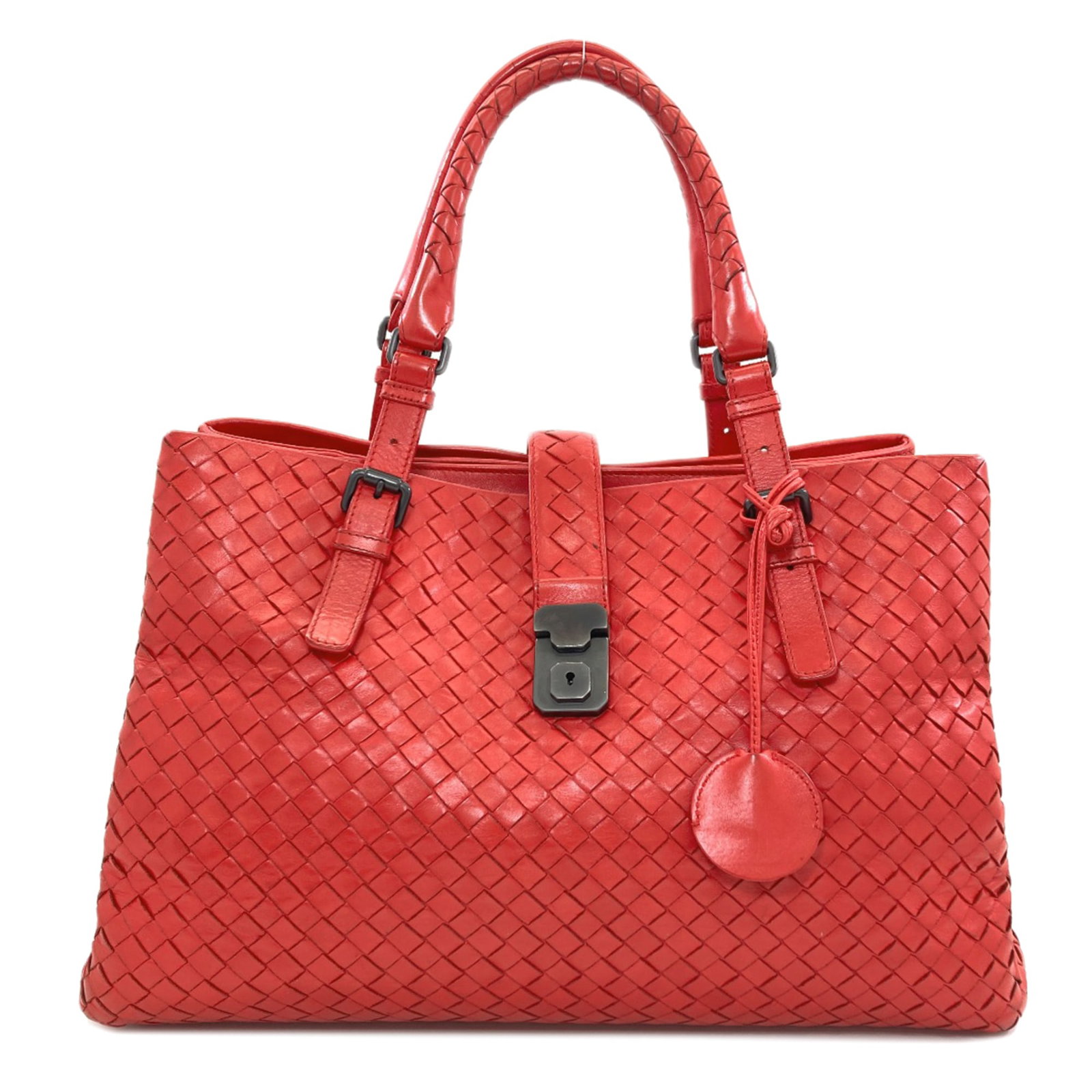 Veneta Bottega Leather Tote Bag: Veneta Bottega Leather Tote Bag The Veneta Bottega Leather Tote Bag boasts a striking red color and elegant design, showcasing the signature Intrecciato pattern. Crafted from high-quality calfskin lea