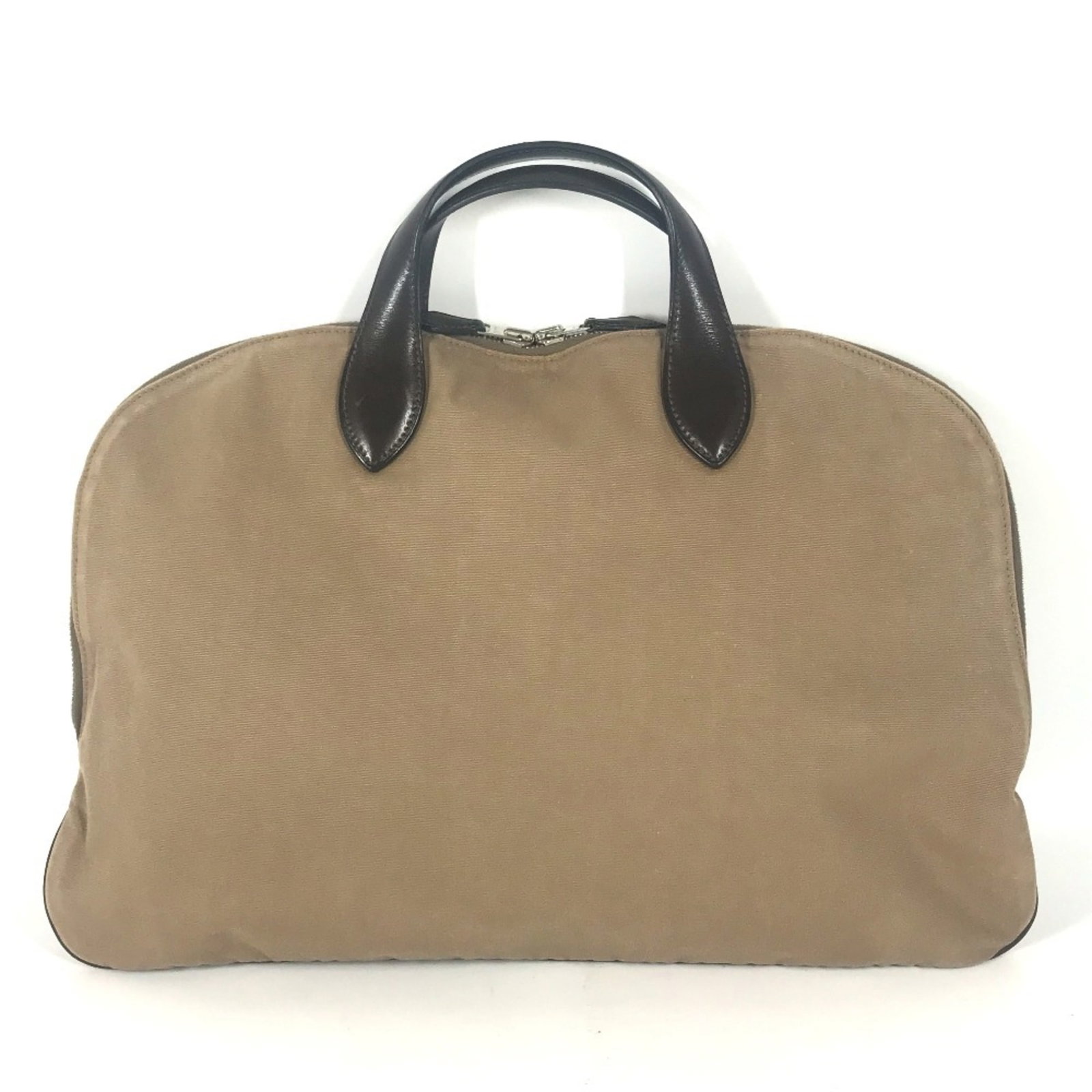 Handbag Tote Bag Hermes Leather Canvas: Handbag Tote Bag Hermes Leather Canvas Leather and canvas come together in this classic Edit 42 tote bag from Hermes, crafted in France with a timeless beige and dark brown color scheme. The bag featu