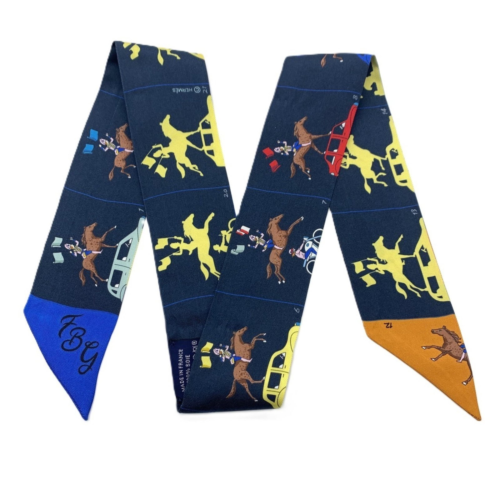 Silk Hermes Scarf 100: Silk Hermes Scarf 100 Silk from the iconic Hermes Line, this Twilly scarf boasts a vibrant multi-color design and a classic navy accent, all wrapped in luxurious 100% silk fabric. Measuring 86cm x 6cm