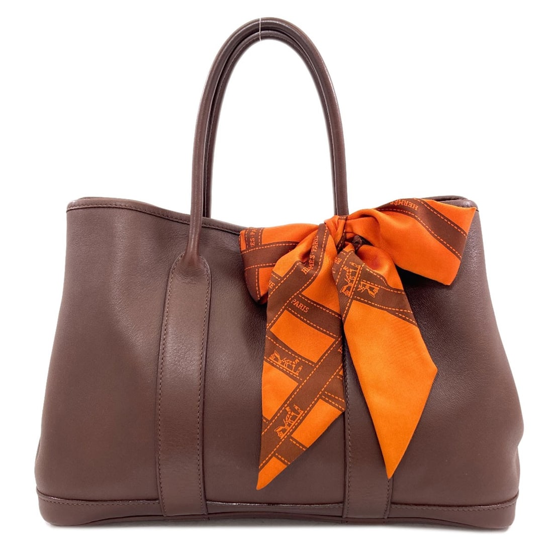 Handbag Tpm Swift Twily Garden Hermes: Handbag Tpm Swift Twily Garden Hermes Brown Herm?s Swift Twily Garden Handbag with Snap Closure. This 8.3 inch, 5.5 inch bag features a distinctive Swift Twily Garden design on the exterior, with a