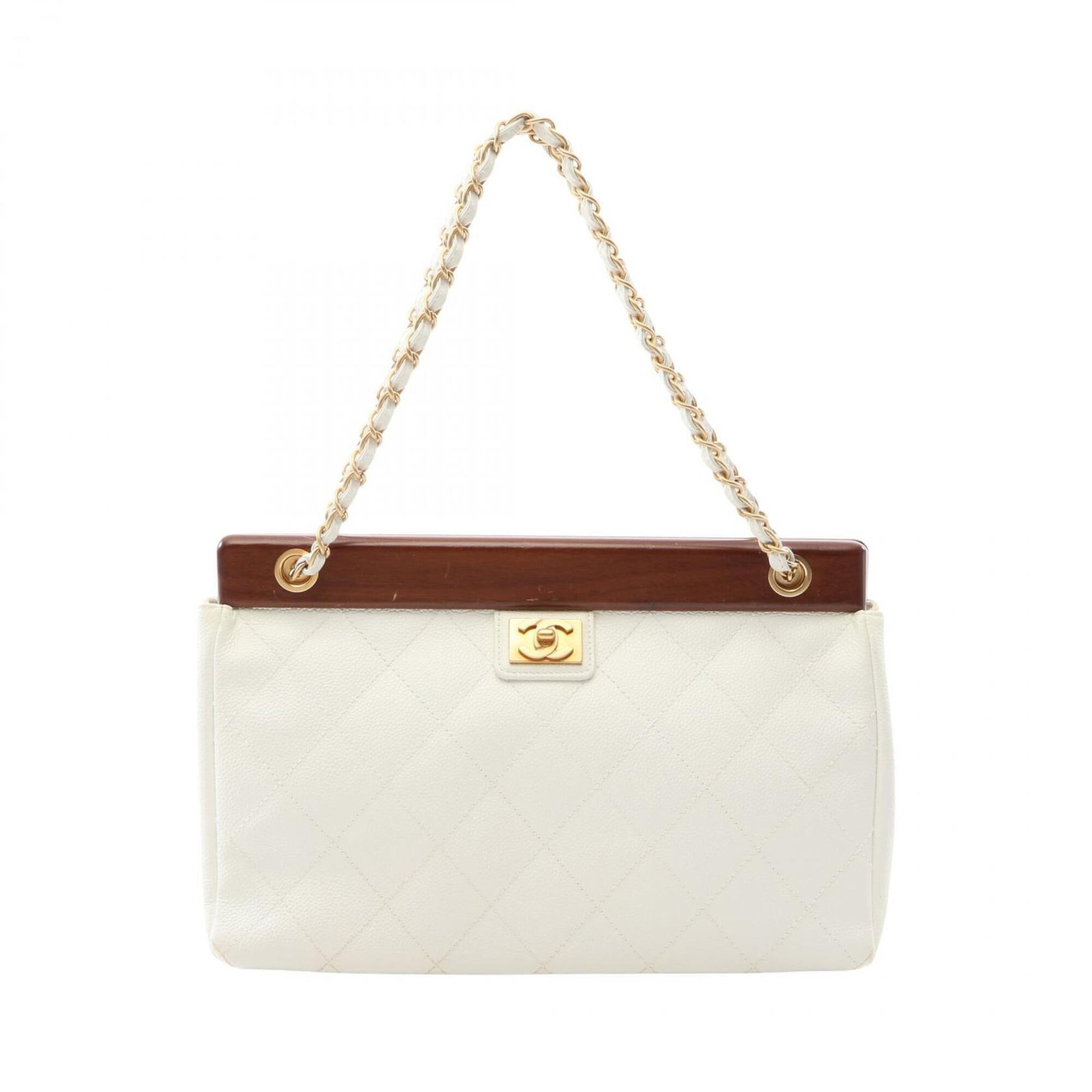 Calfskin Handbag Chanel Wood: Calfskin Handbag Chanel Wood Grained Calfskin and Wood Construction. This Chanel handbag boasts a rich, brown and white color scheme, complemented by gold hardware. Its compact size and classic