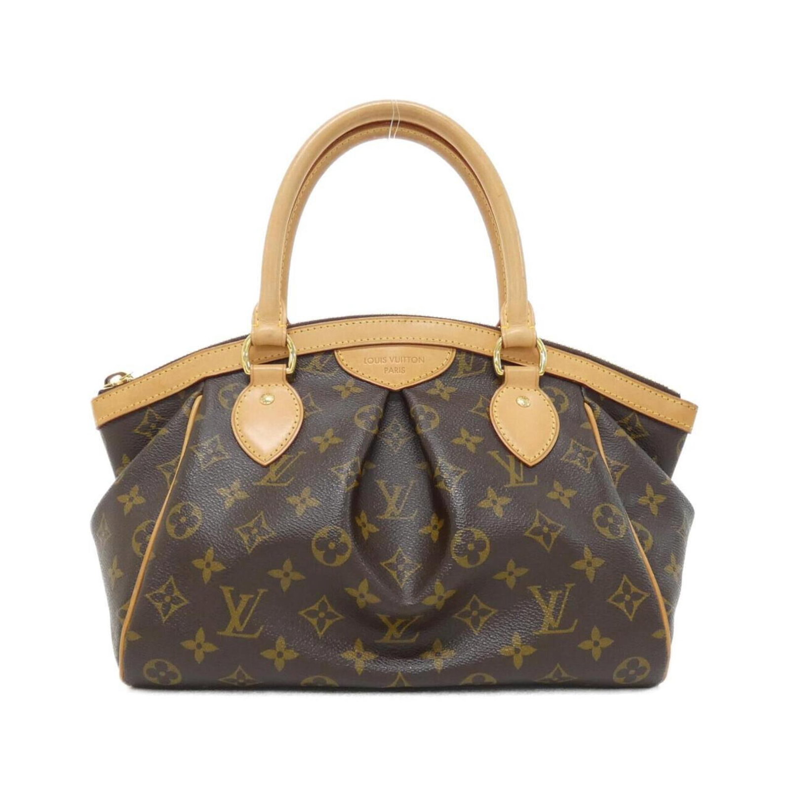 Louis Vuitton Handbag Coated Canvas: Louis Vuitton Handbag Coated Canvas Coated canvas construction adds durability to this Louis Vuitton handbag, while the monogram pattern provides a touch of iconic style. Measuring 21cm x 36cm x 15cm,