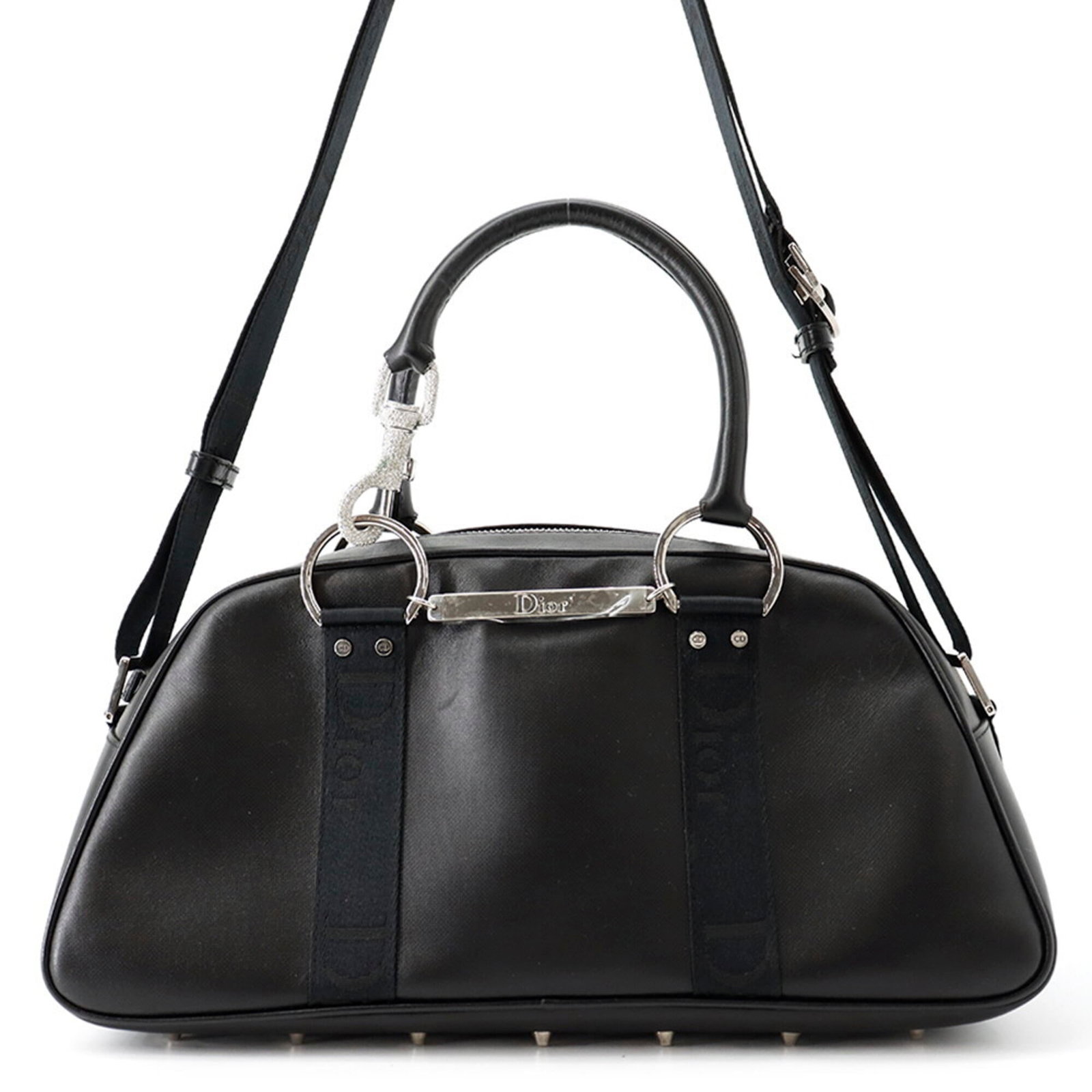 Handbag Leather Canvas Christian Dior: Handbag Leather Canvas Christian Dior Christian Dior's iconic handbag is crafted from a combination of luxurious leather and canvas, resulting in a unique and stylish design. Measuring 16cm x 34cm x