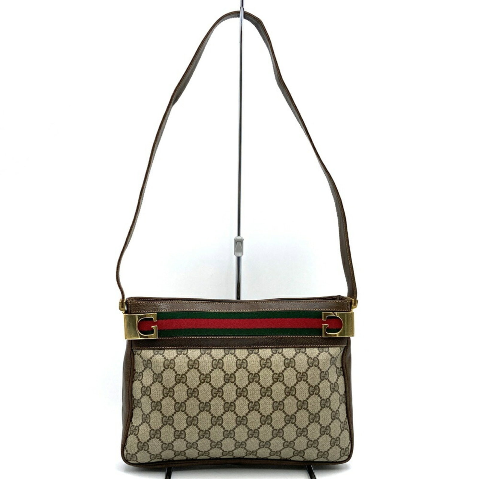 Gucci Supreme Gg Bag Pvc: Gucci Supreme Gg Bag Pvc Gucci Supreme Gg Bag Pvc is a stylish shoulder bag made from GG Supreme and PVC materials, featuring a brown color and a zipper closure. Notable details include a zipper