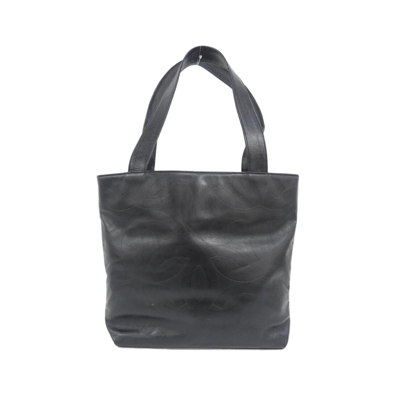 Handbag Leather from Chanel: Handbag Leather from Chanel This black Chanel handbag is crafted from high-quality calfskin leather, offering a sleek and sophisticated design. Measuring 28cm x 27cm x 8cm, it features a classic shape