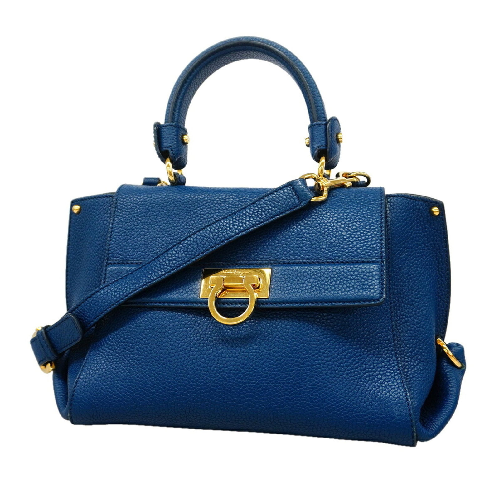 Salvatore Ferragamo Handbag Leather: Salvatore Ferragamo Handbag Leather Salvatore Ferragamo Handbag Leather is a stunning blue leather handbag with gold hardware, measuring 17cm x 23cm x 13cm. This elegant piece boasts a classic design